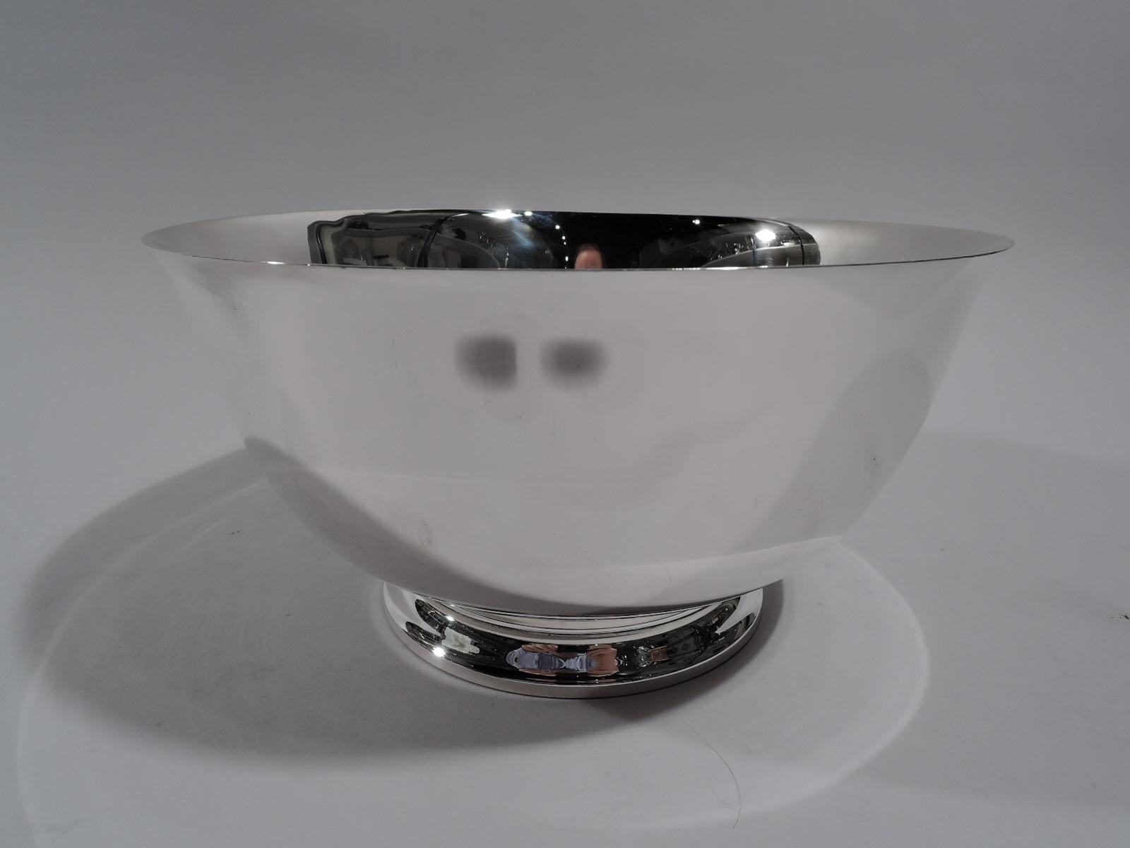 Colonial Revival sterling silver bowl. Made by Watson Company in Attleboro, Mass.,circa 1930. Round and curved with flared rim and round and stepped foot. Lots of room for engraving. Fully marked including no. B264 and phrase “Exemplar / Paul Revere