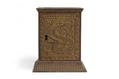 American Country Antique Cast Metal Japanese Motif Rectangular Coin Bank