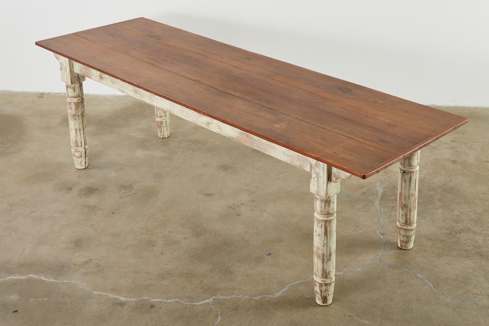 American Country Painted Pine Farmhouse Dining Table In Distressed Condition For Sale In Rio Vista, CA