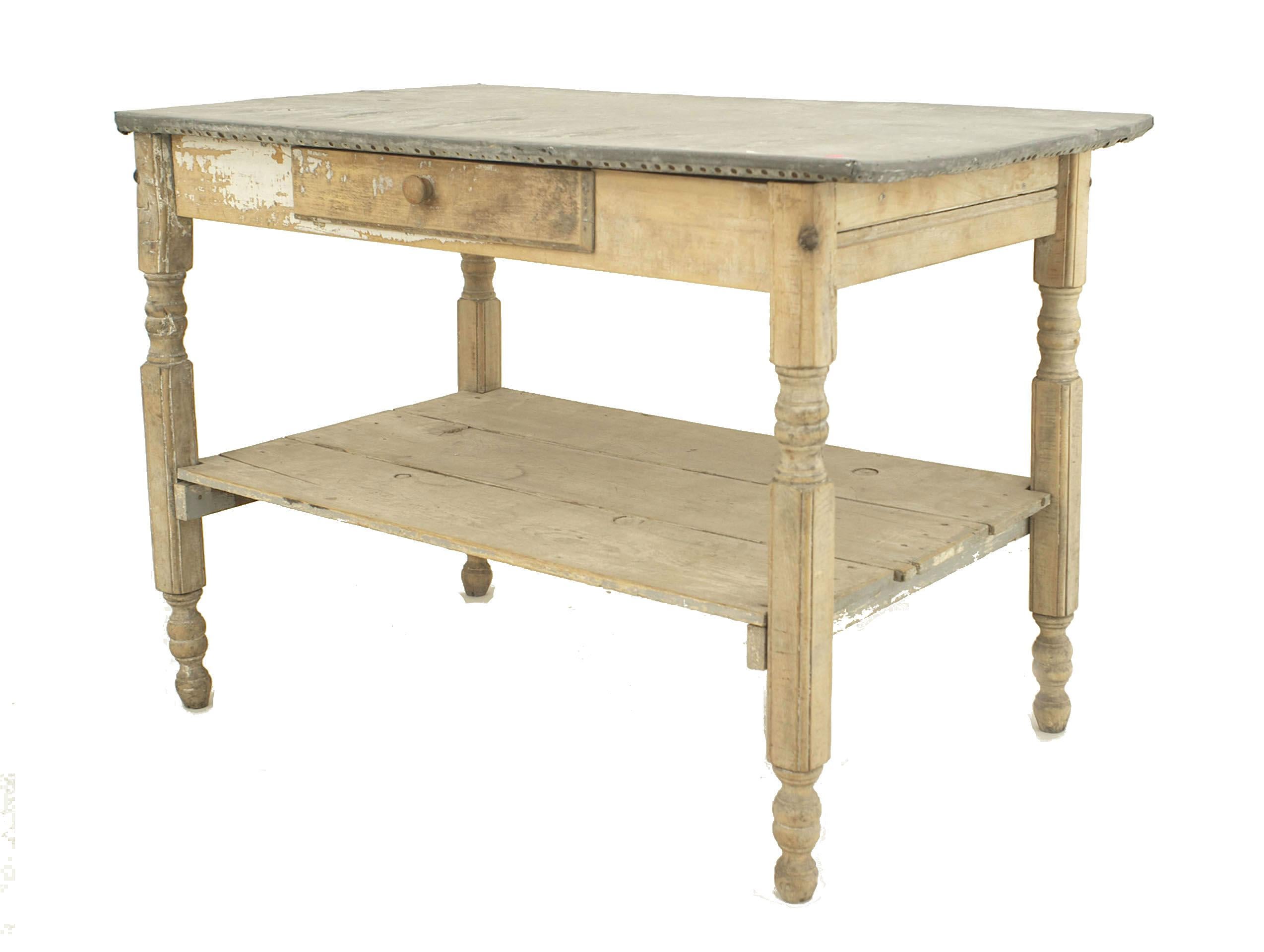 American Country Rustic style (19th Century) rectangular stripped antique weathered work table with a zinc top and a shelf stretcher.
