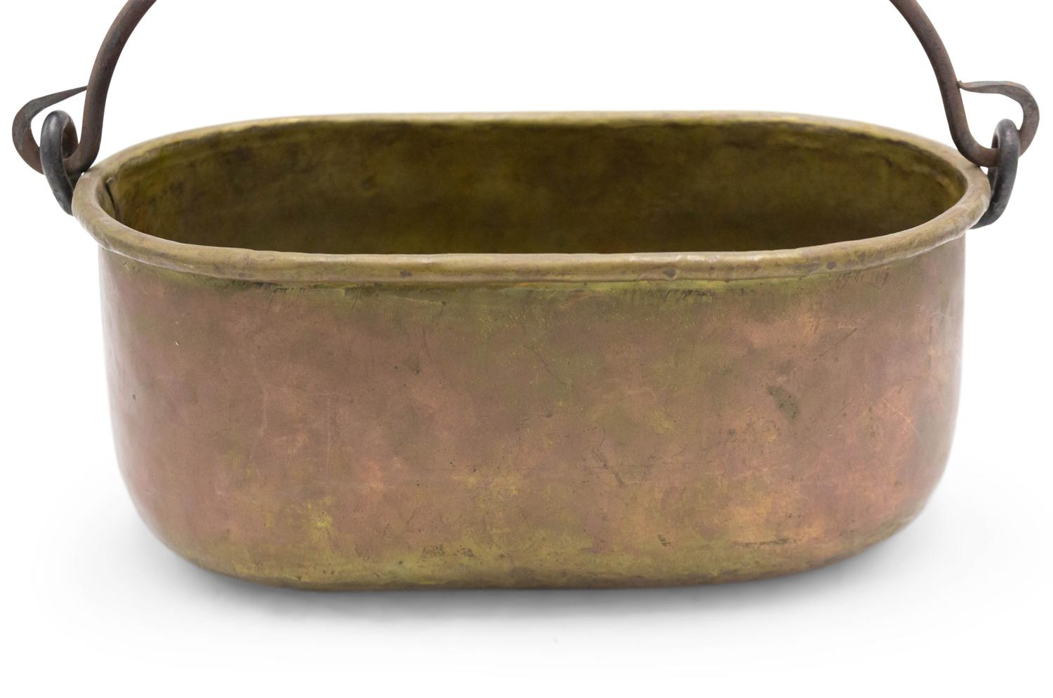 American Country-style (19/20th Century) brass oval pot with wrought iron handle