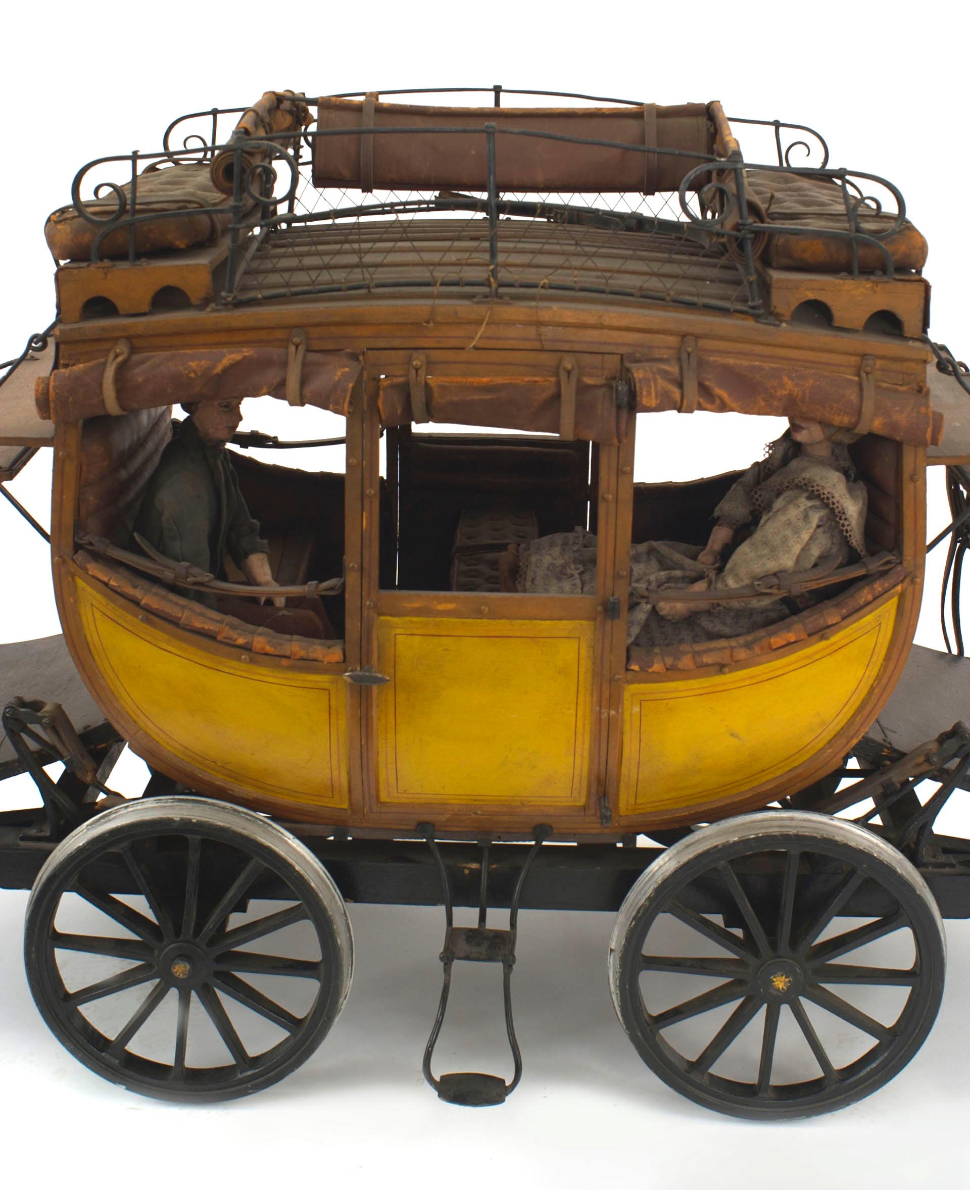 Modèle en bois peint de style country américain (20e siècle) représentant une voiture de train de Dewitt avec des personnages de poupée (voir #037074 - pièce complémentaire, machine à vapeur Stephenson's Rocket).
