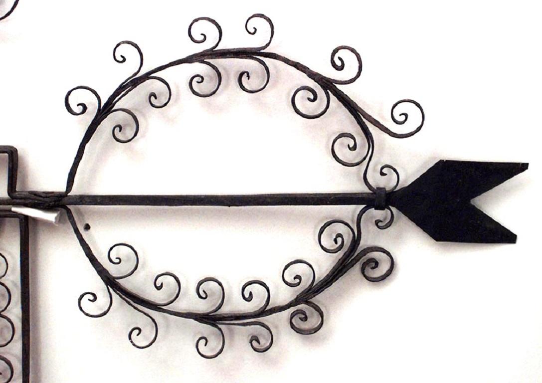 2 American Country (20th century) wrought iron weather vanes with rooster and scroll design (Priced each).