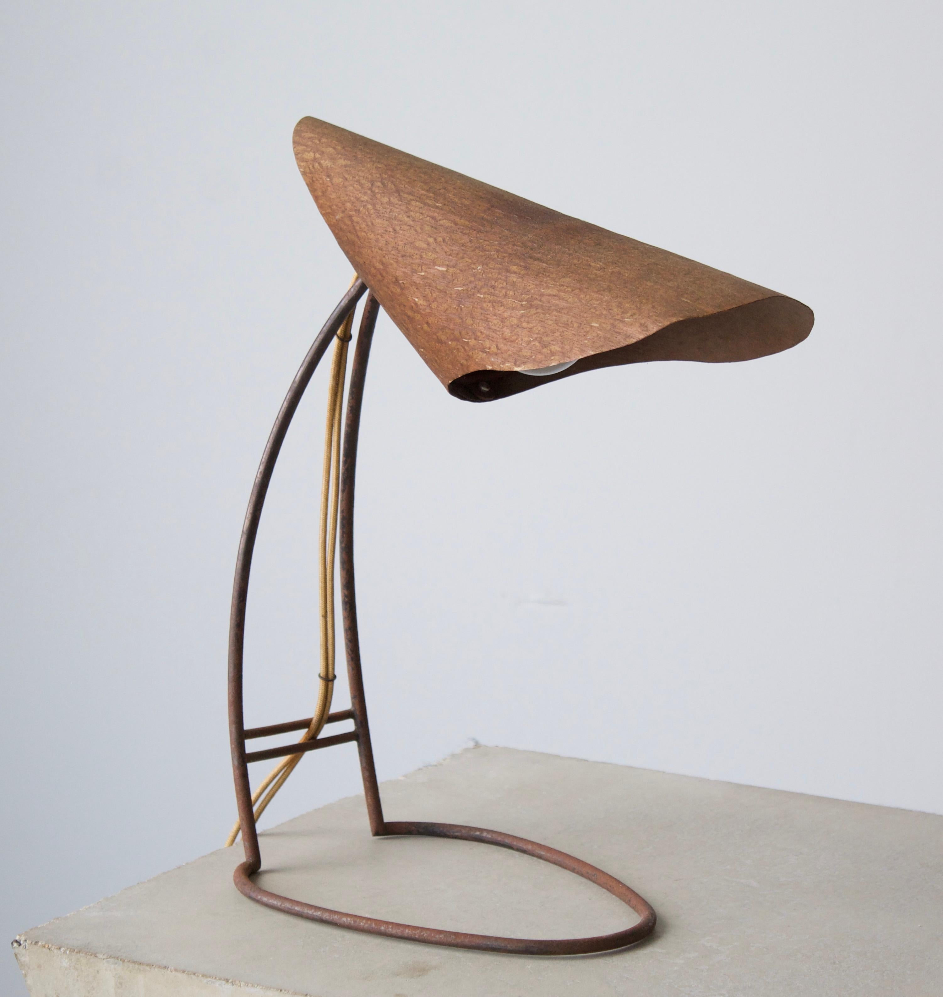 A table lamp. By unknown studio craftsman.

Other designers of the period include Alexandre Knoll, George Nakashima. Isamu Noguchi, J.B. Blunk and Paul Frankl.