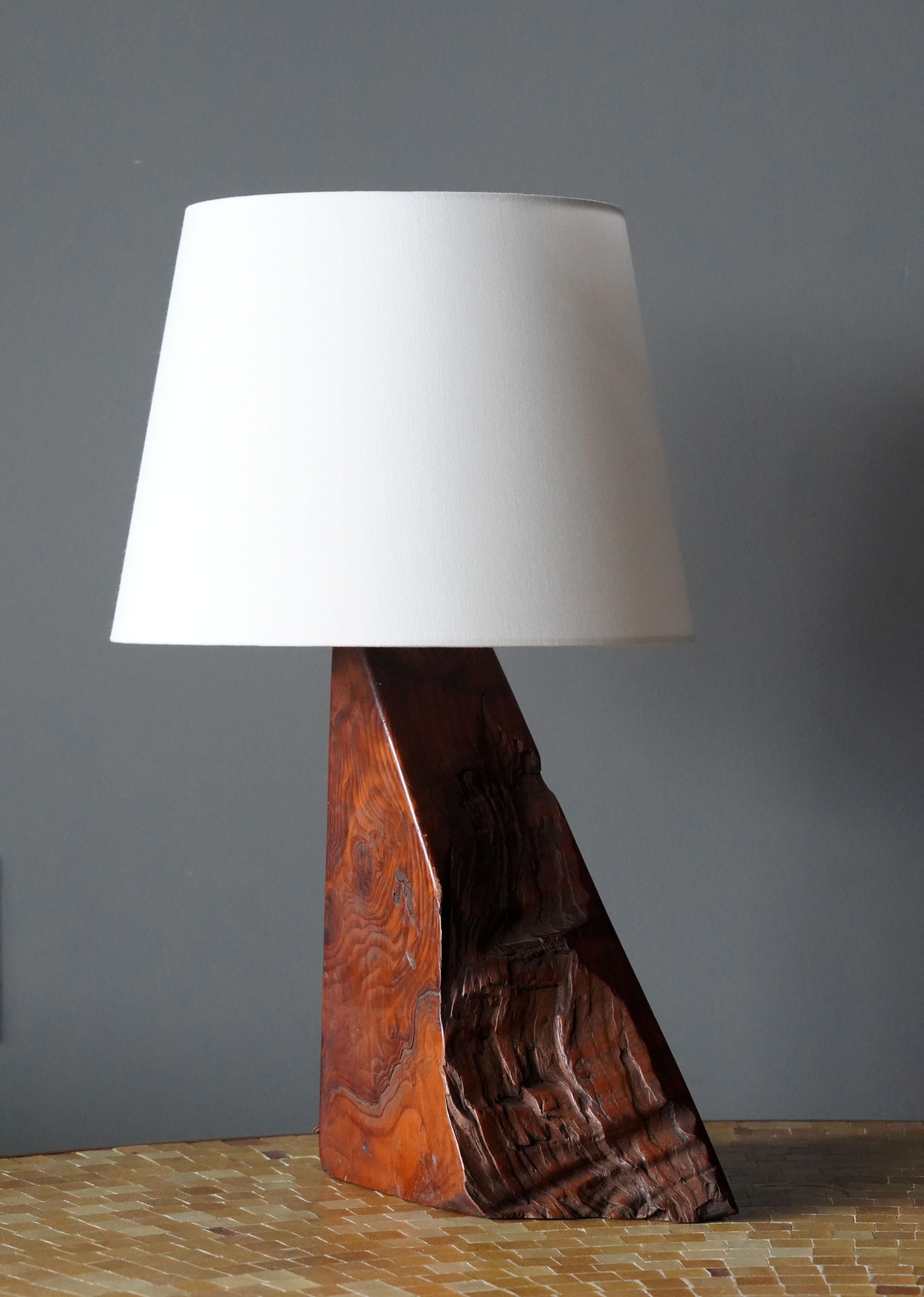 A table lamp. In hand-sculpted burl wood. By unknown studio craftsman.

Sold without lampshade. Stated dimensions excluding bulbs and lampshade.

Other designers of the period include Alexandre Knoll, George Nakashima, Isamu Noguchi, J.B. Blunk