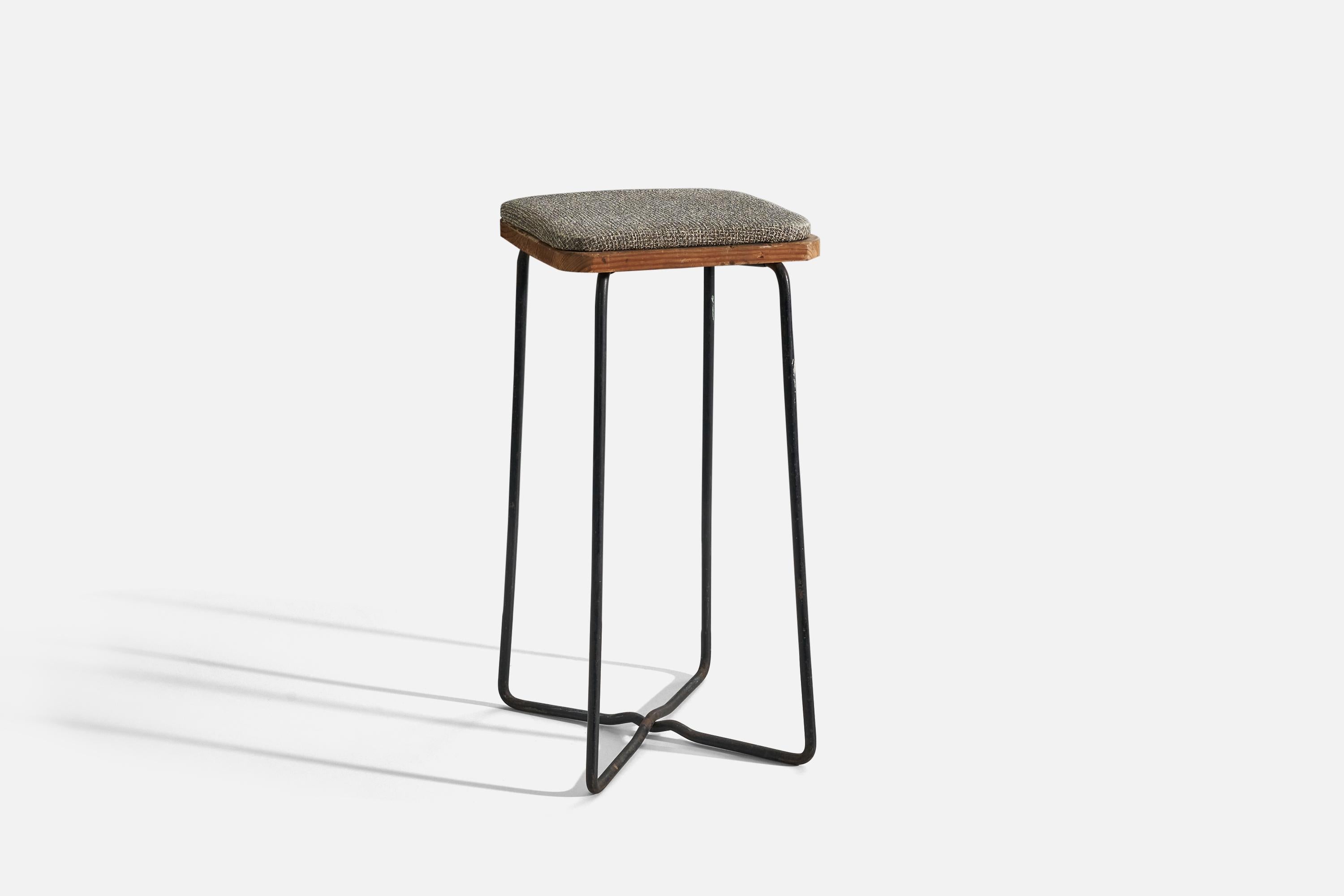 A wood, metal and fabric stool designed and produced in the United States, 1940s.