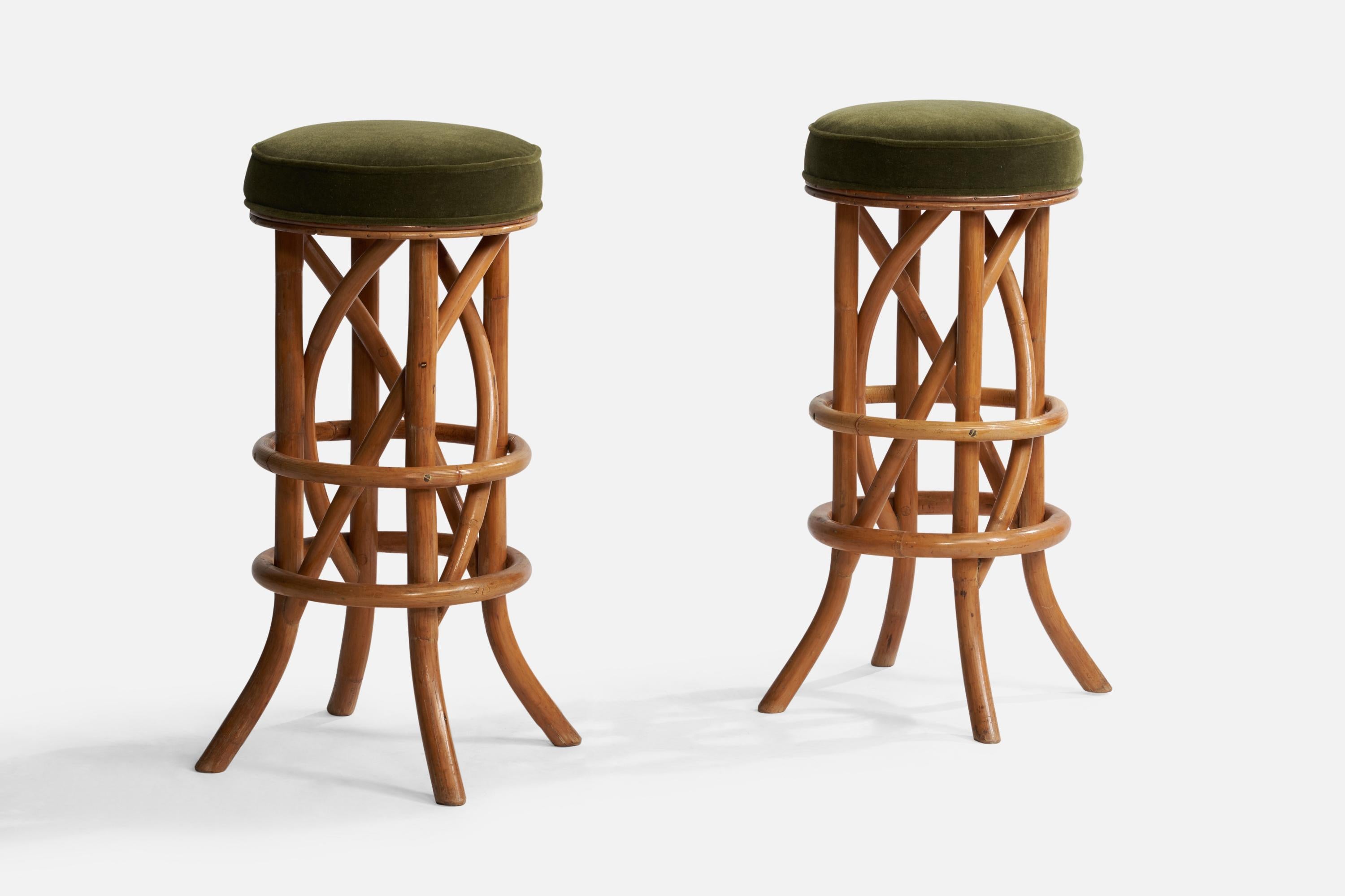 A pair of moulded bamboo and green mohair bar stools designed and produced in the US, c. 1950s.

Seat height: 31.5”