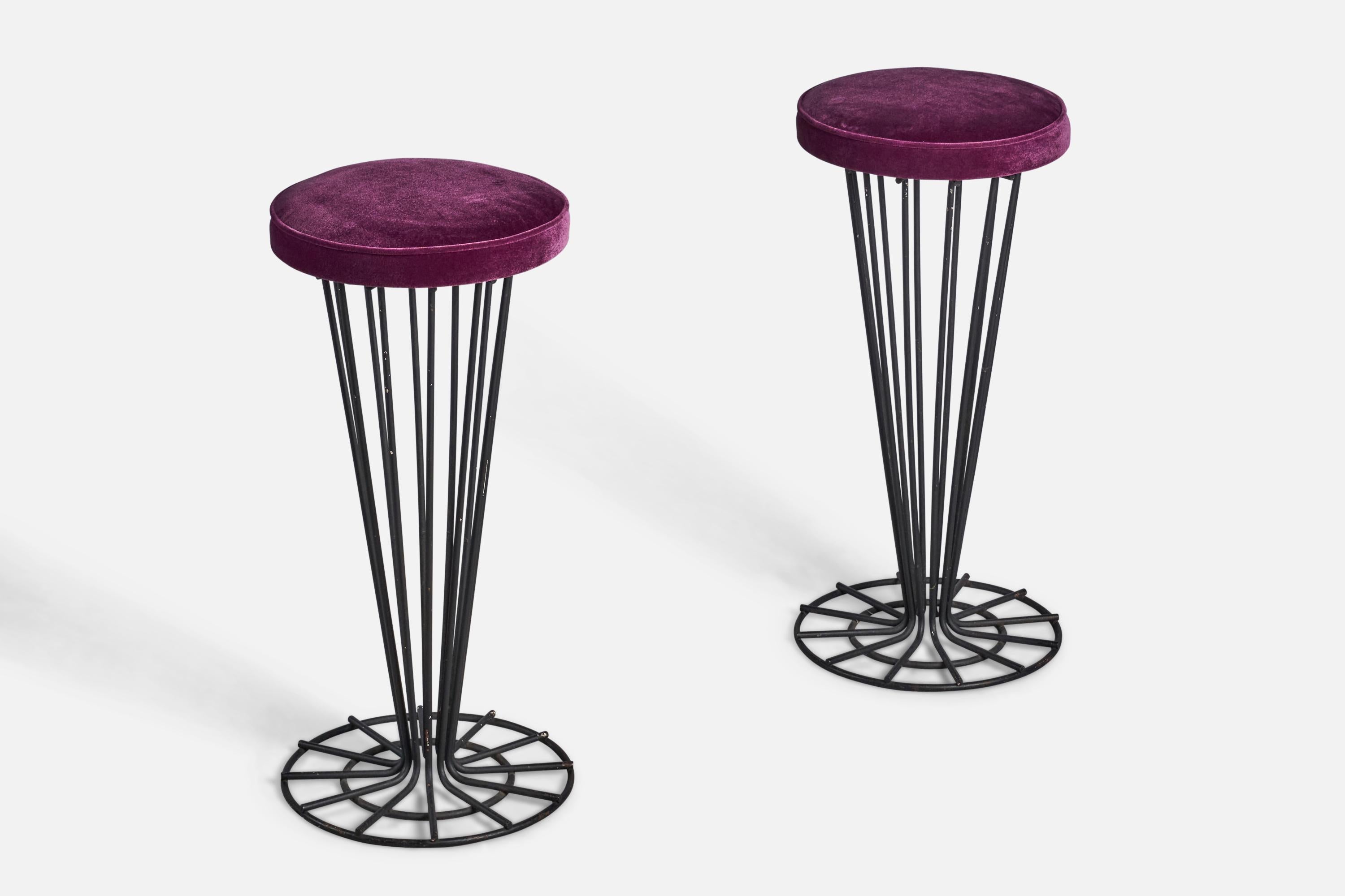 A pair of black-painted iron and purple velvet stools designed and produced in the US, c. 1940s.