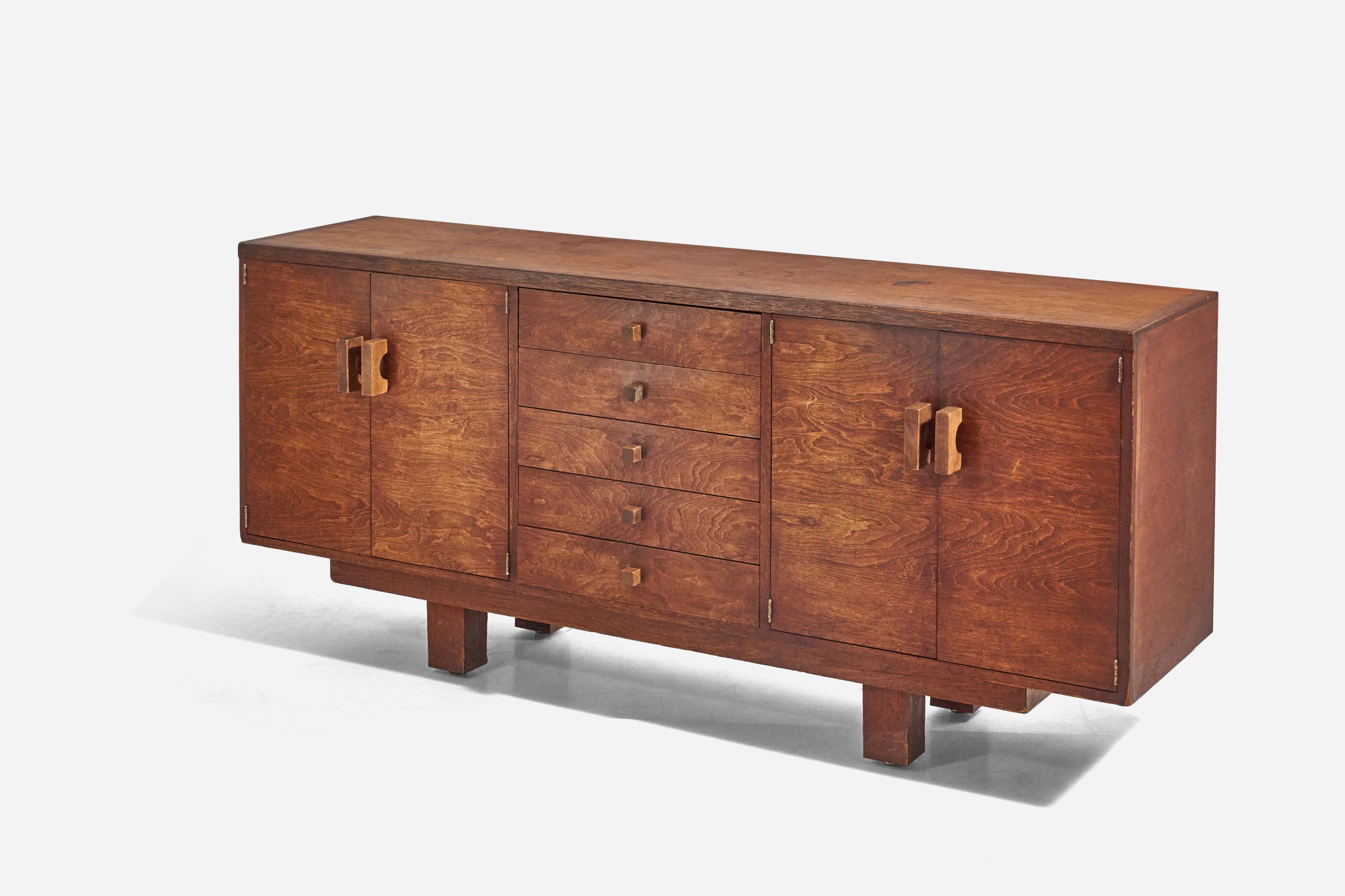 A oak cabinet / dresser designed and produced in the United States, 1960s.