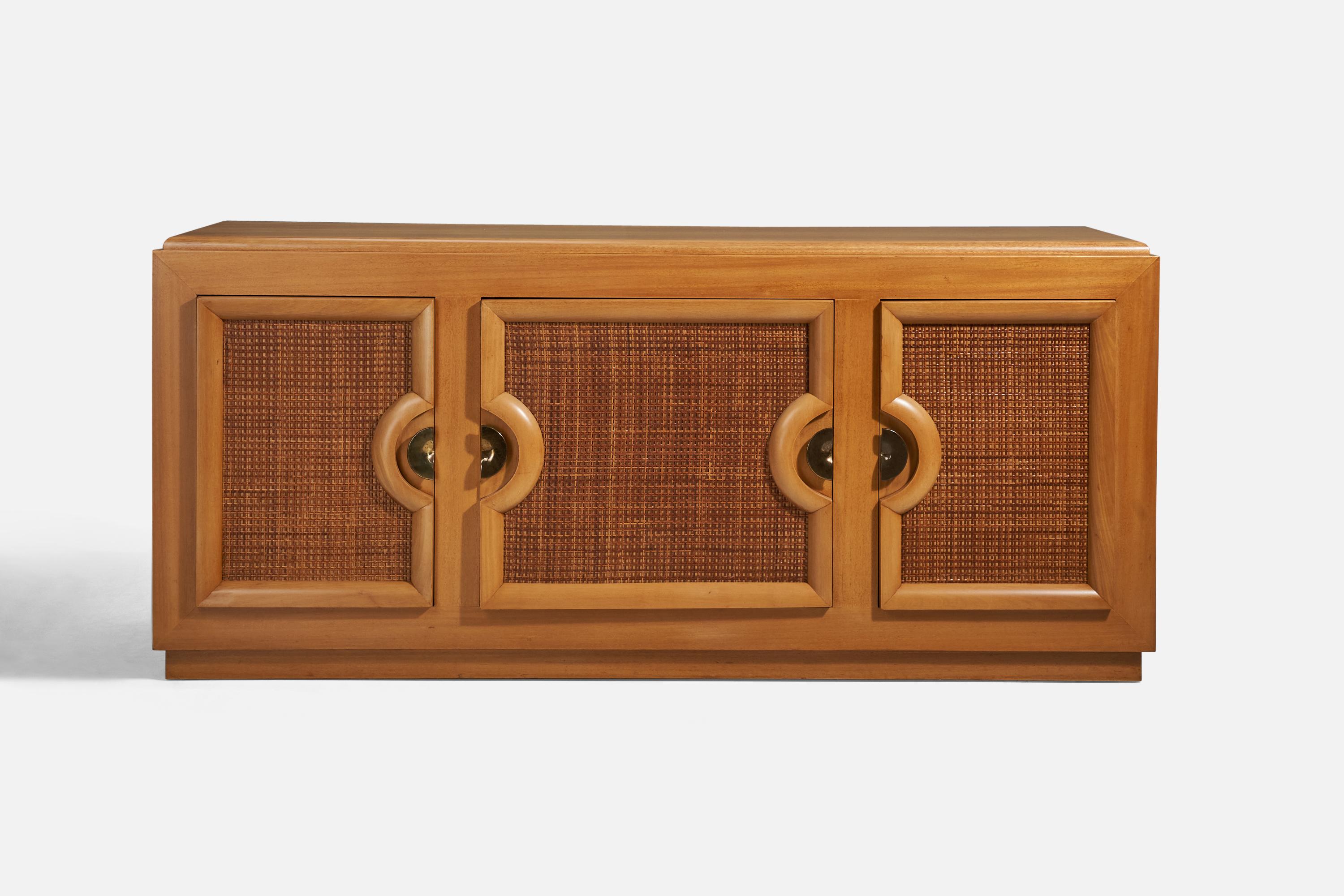 A wood, brass and rattan cabinet designed and produced in the United States, 1940s.