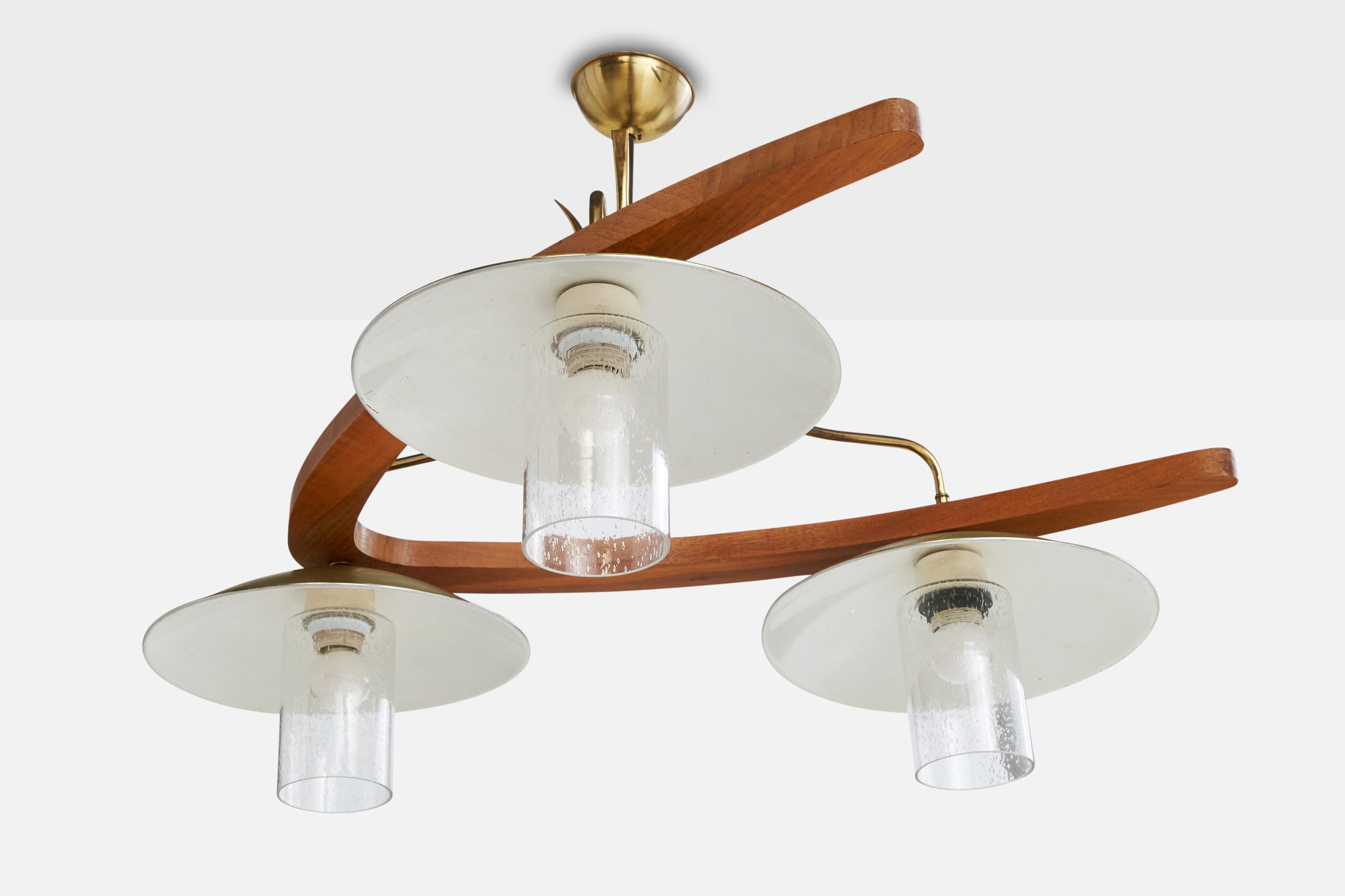 A brass, teak and glass chandelier designed and produced in the US, c. 1950s.

Overall Dimensions (inches): 23.5” H x 33” Diameter

Dimensions of Canopy: 1.5“ H x 4” Diameter

Stem length: 5.5” H

Bulb Specifications: E-26

Number of Sockets:
