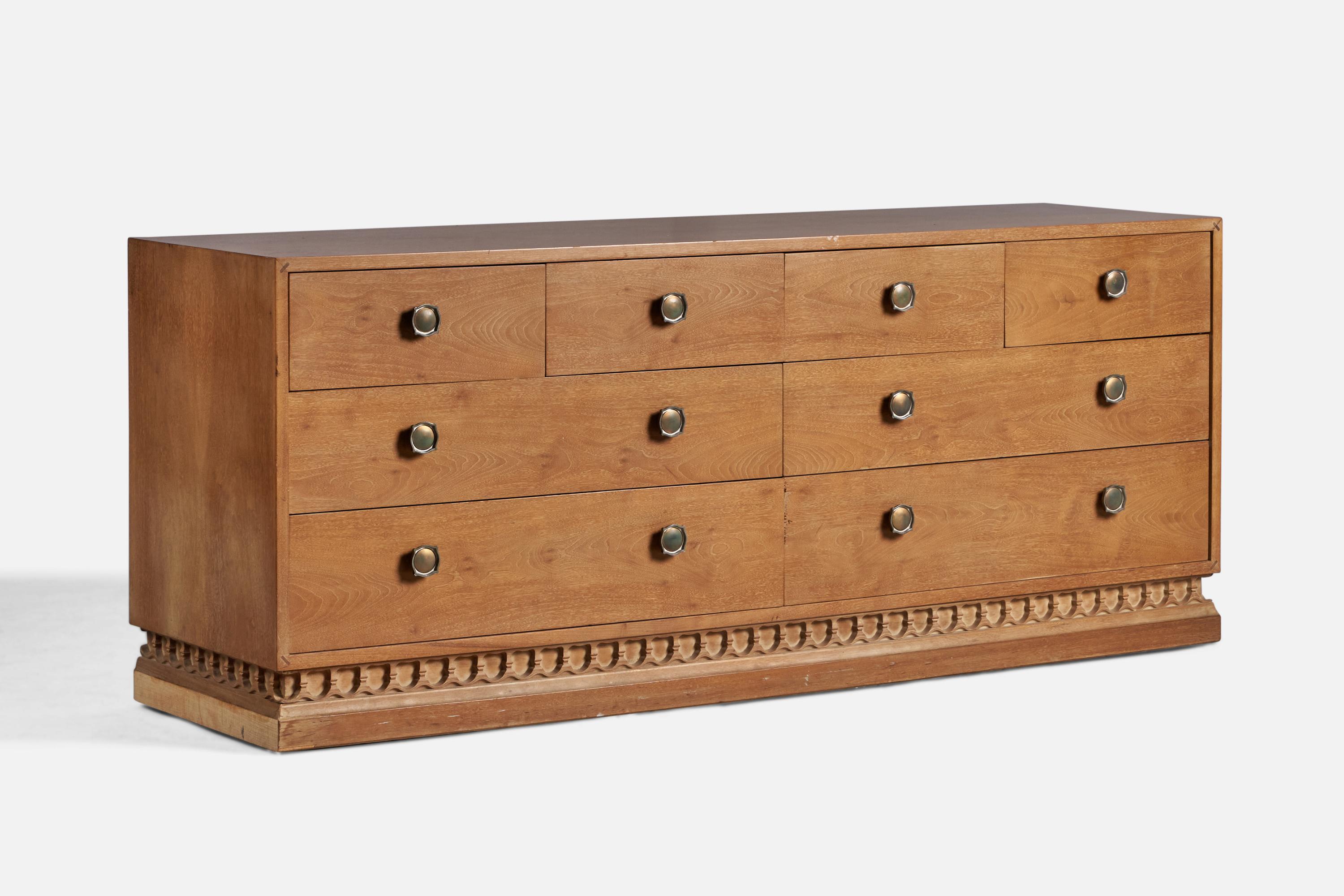 An oak and brass chest of drawers, from John Van Koert's 