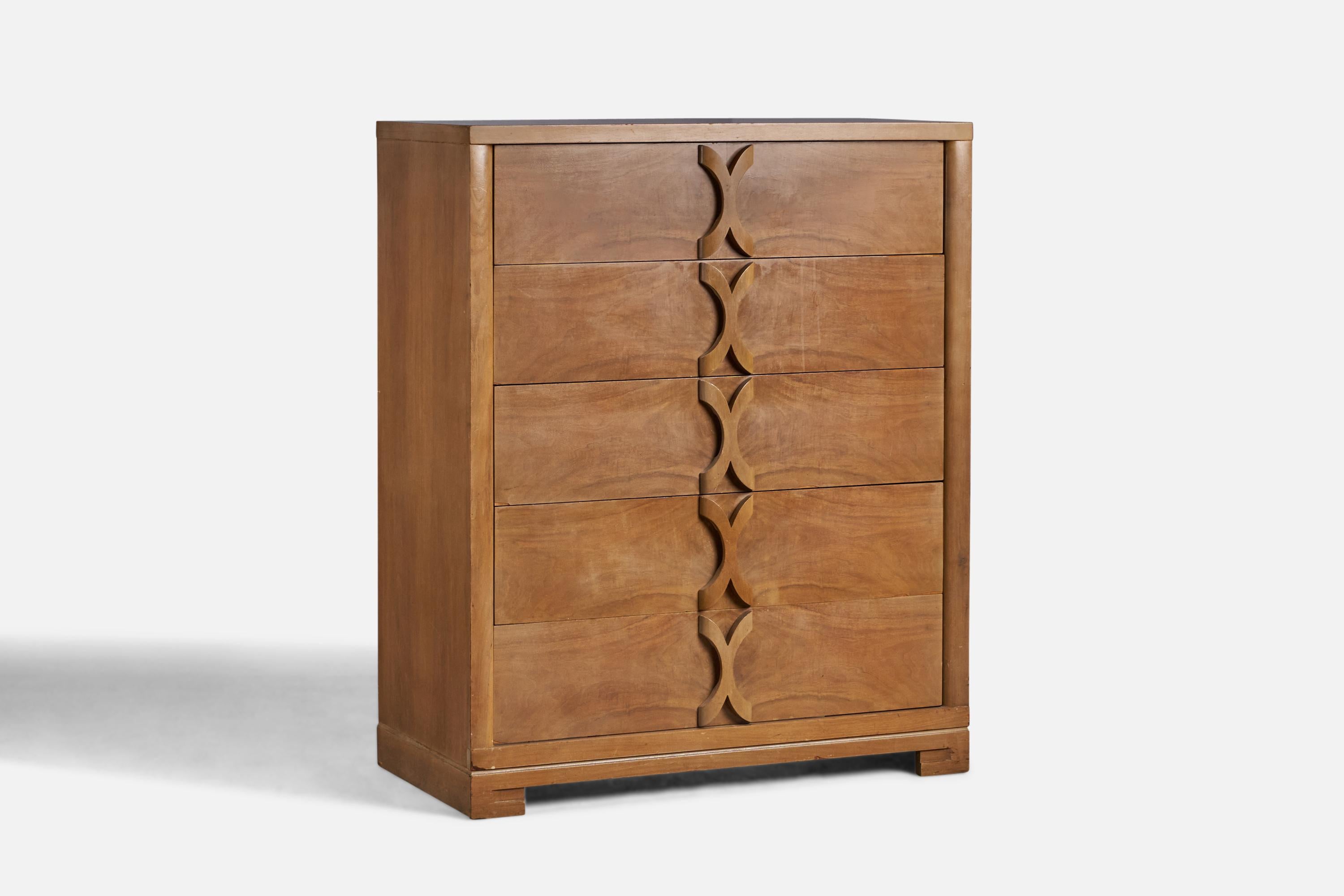 A walnut chest of drawers designed and produced in the US, 1940s.