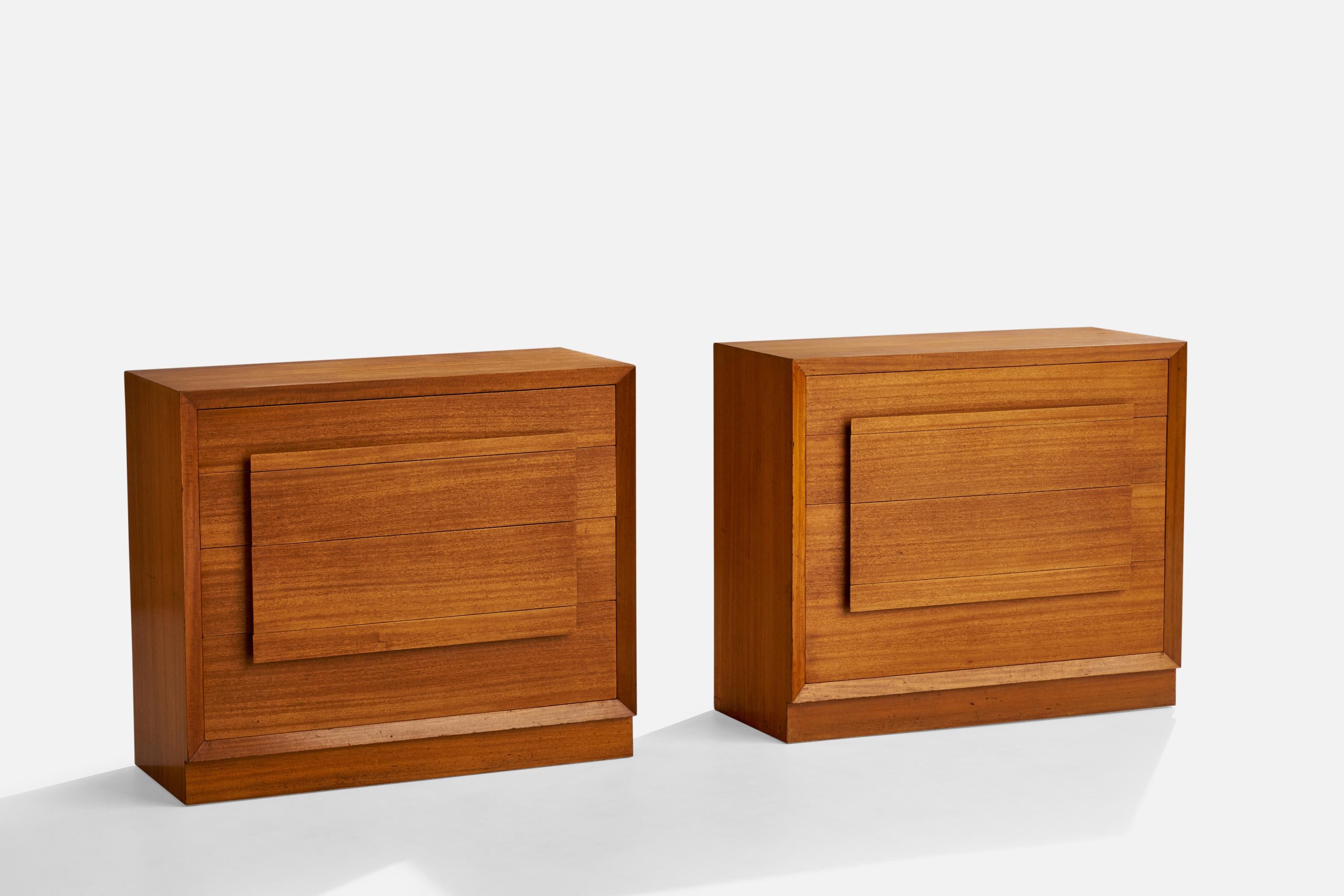 A pair of walnut chests of drawers designed and produced in the US, 1940s.