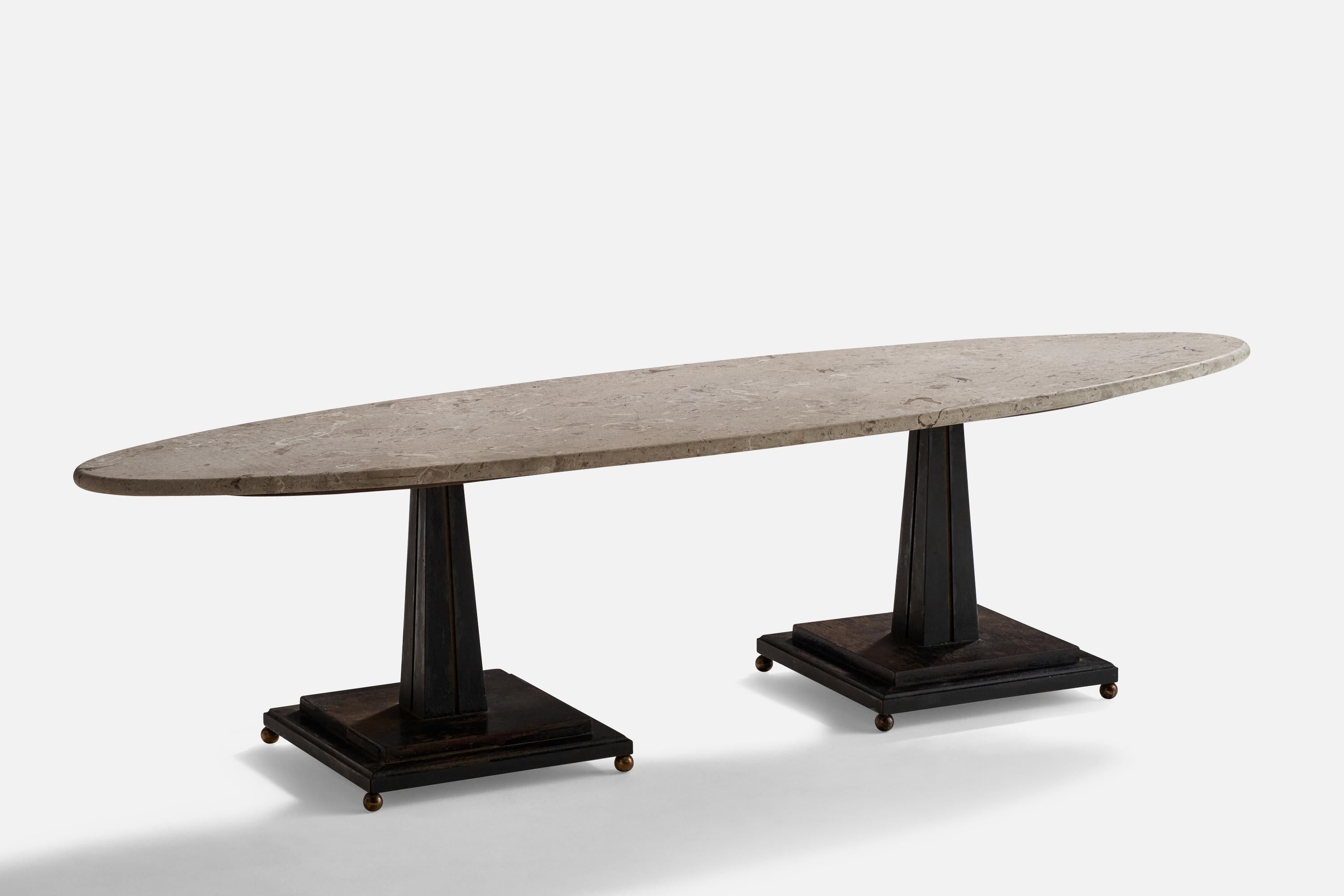 A travertine, dark-stained wood and brass coffee table designed and produced in the US, c. 1940s.