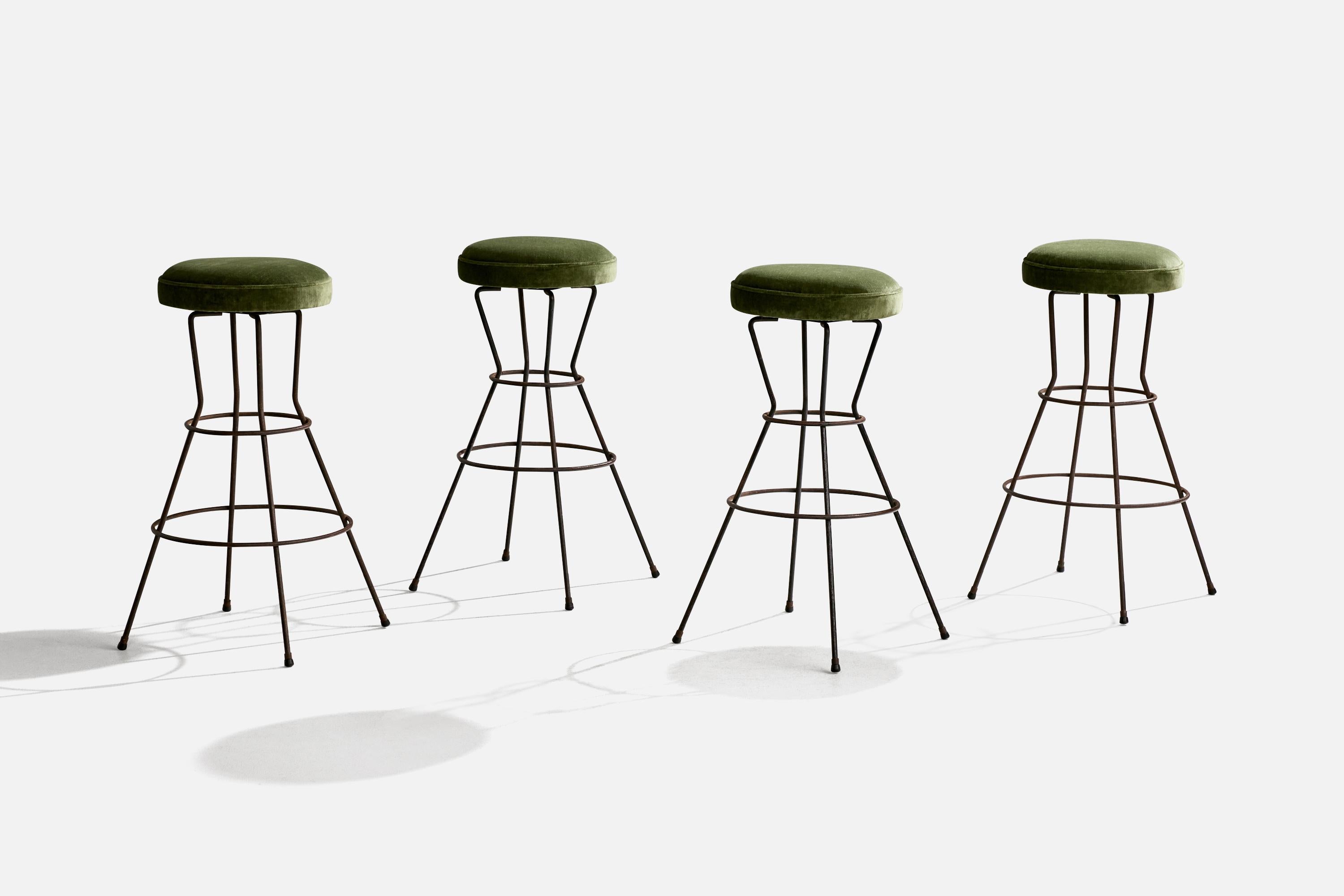 A set of four iron and velvet counter stools or bar stools designed and produced in the US, c. 1950s.

Overall Dimensions (inches): 29.75