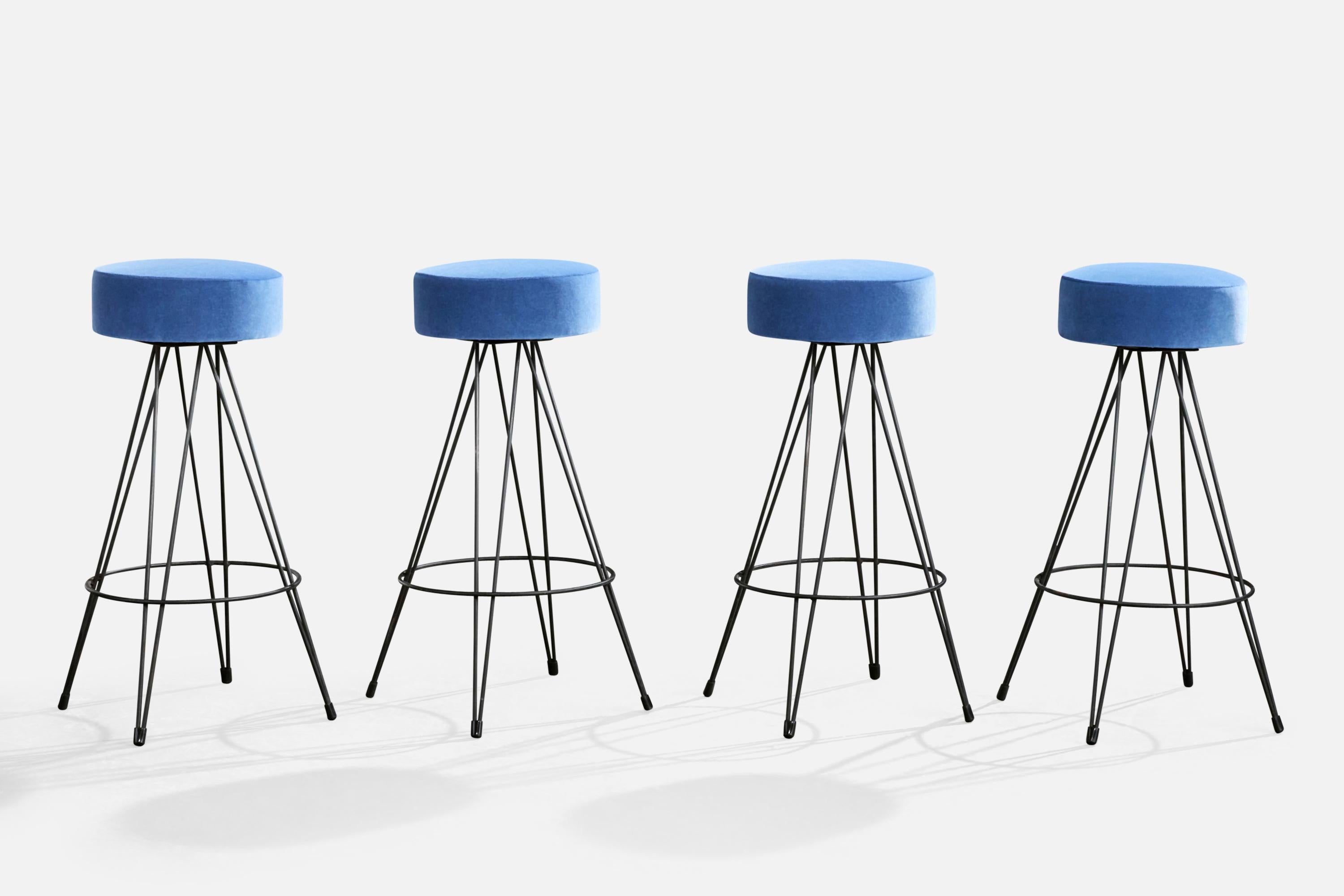 A set of four black-painted iron and blue velvet counter stools or bar stools designed and produced in the US, c. 1950s.

Reupholstered in brand new fabric.

Overall Dimensions (inches): 29.5