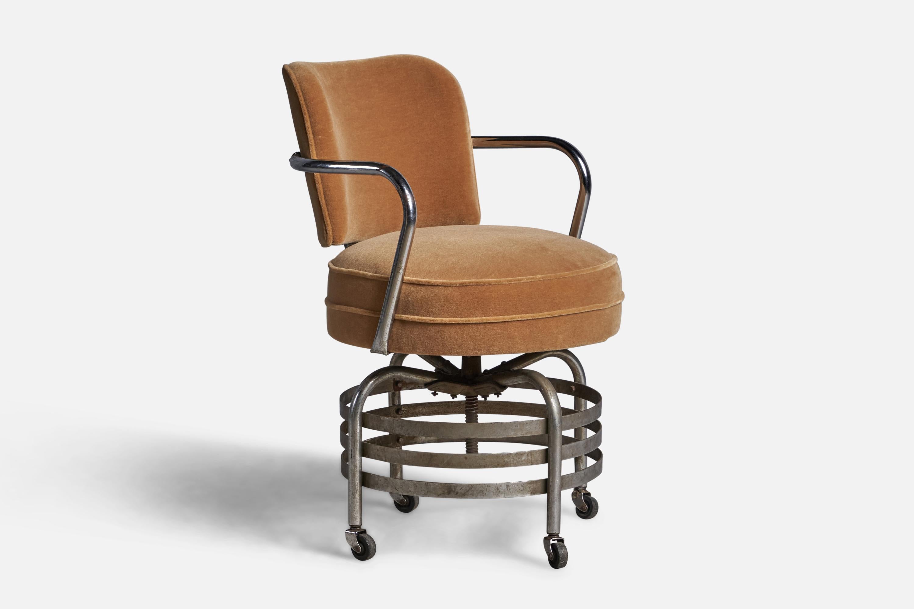 An adjustable chome metal and beige mohair desk chair designed and produced in the US, 1930s. 
21.5” seat height