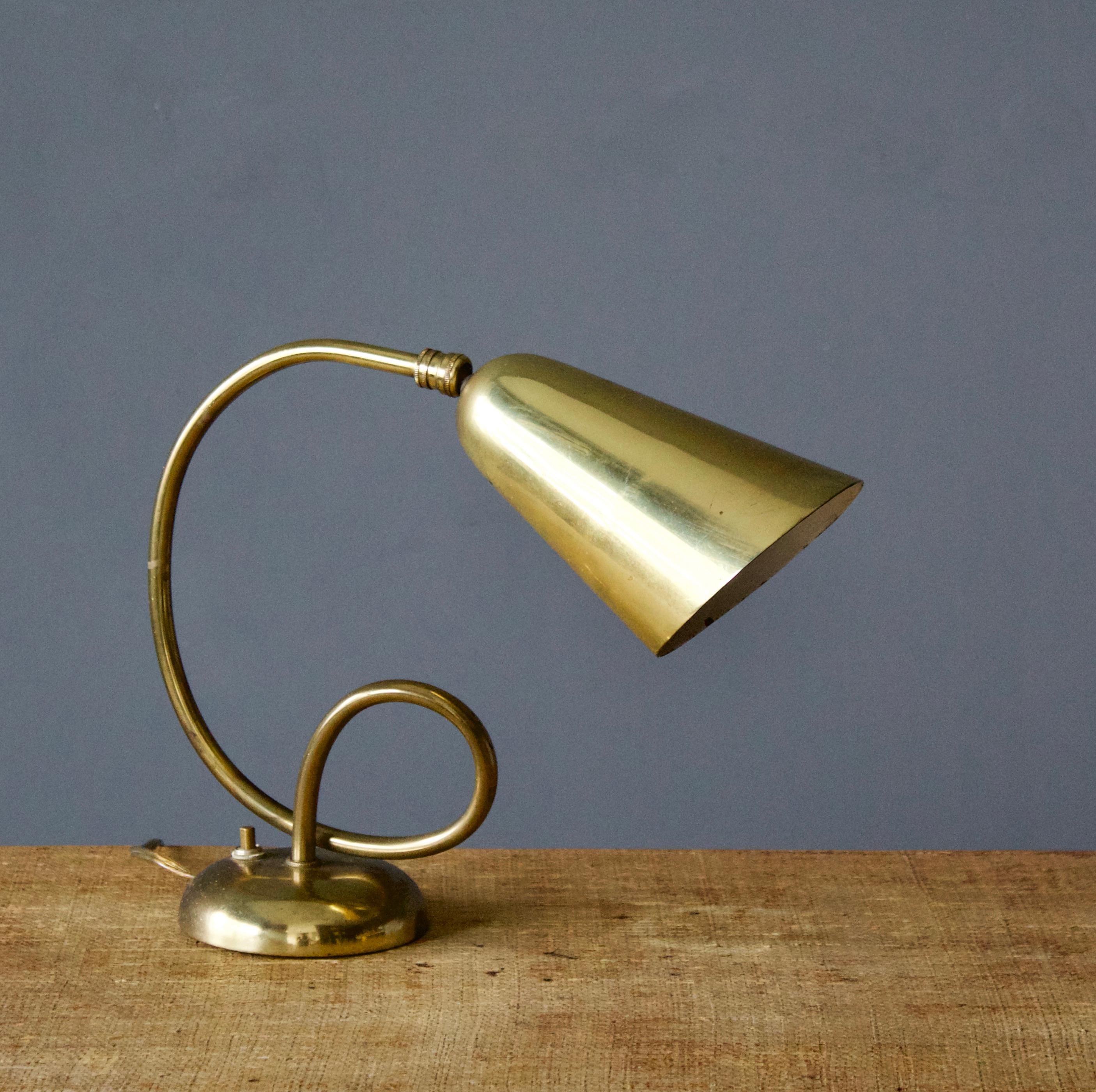 An organic table lamp / desk light. Designed and produced in United States, 1950s.