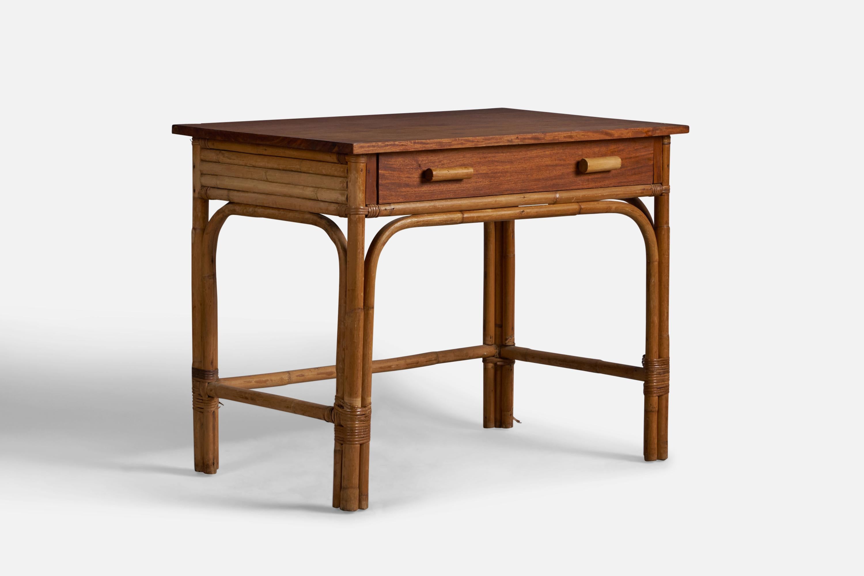 A small oak, bamboo and rattan writing desk designed and produced in the US, c. 1950s.