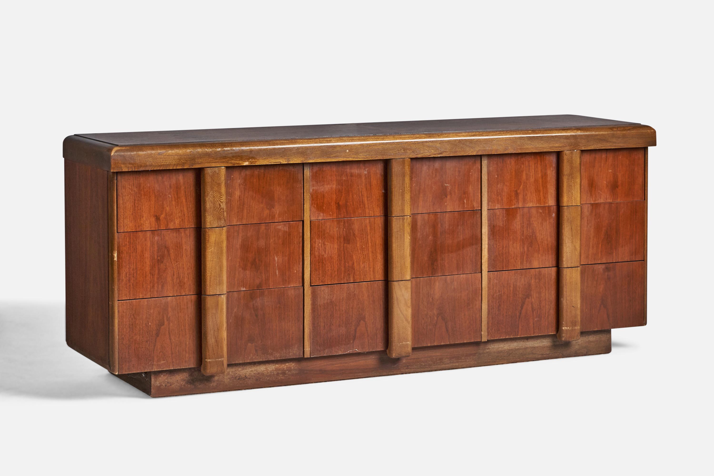 A walnut dresser designed and produced in the US, c. 1950s.