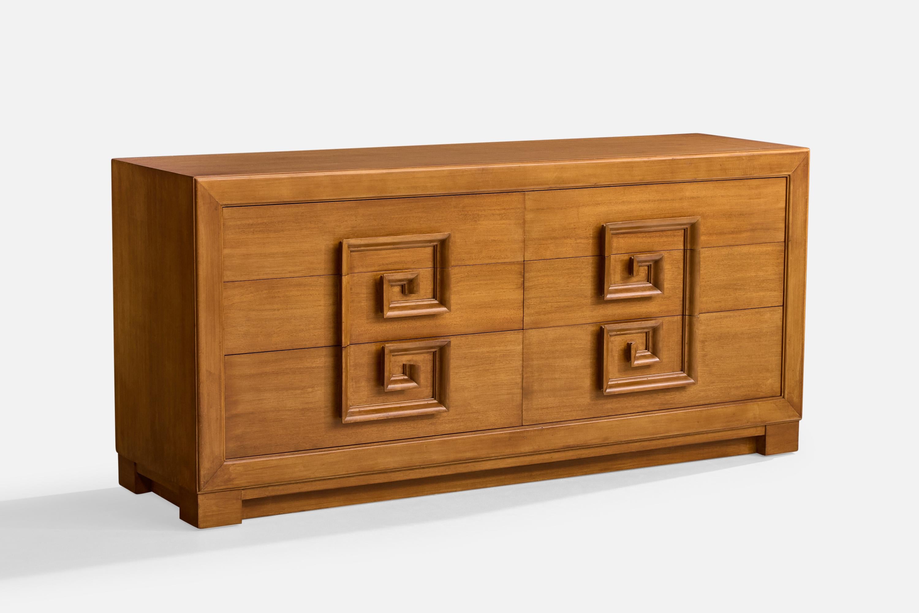 A wood dresser designed and produced in the United States, c. 1950s.

Overall Dimensions (inches): 33.75