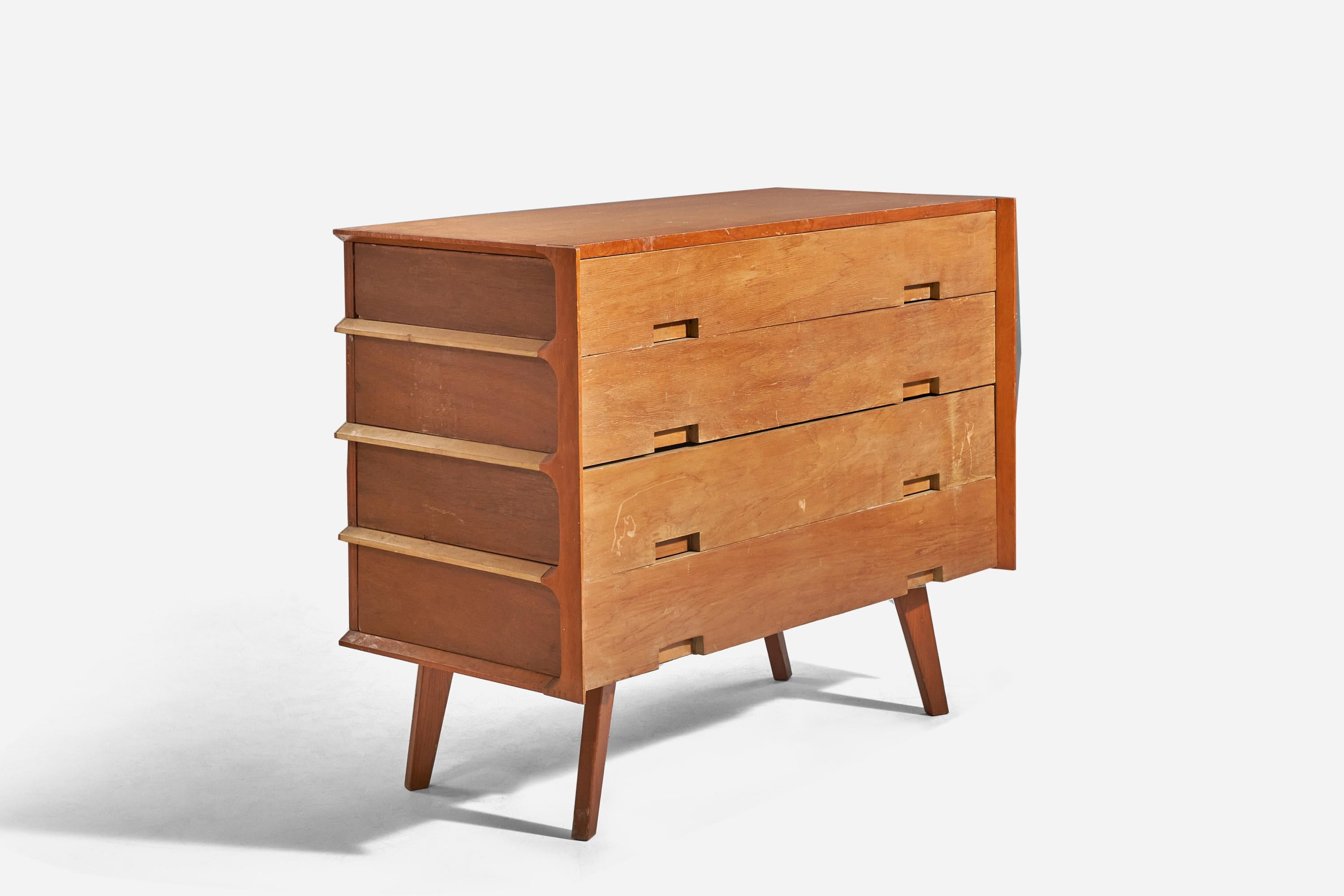 A wooden dresser designed and produced by an American designer, 1950s.
 