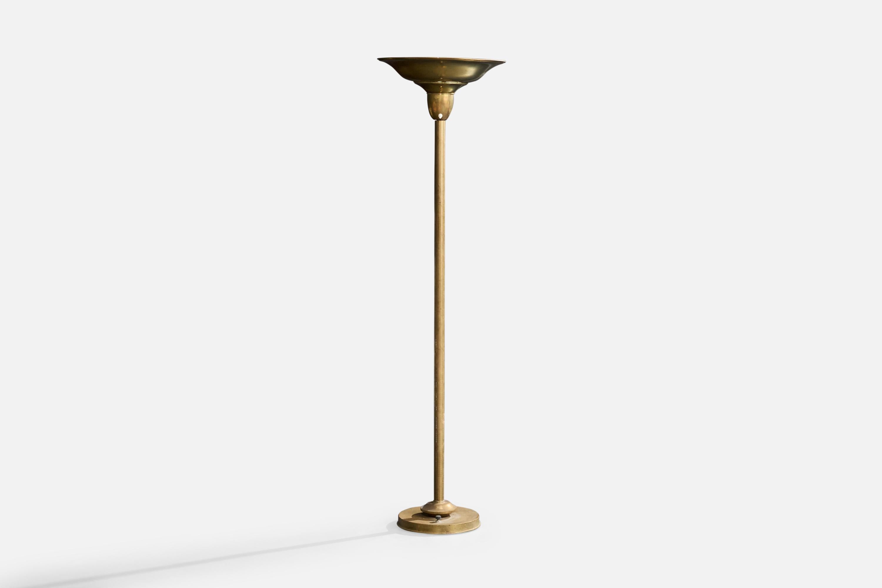 Lámpara de pie o uplight de latón probablemente diseñada y fabricada en EE.UU., c. 1930.

Dimensiones de la lámpara (pulgadas): 66,66 
