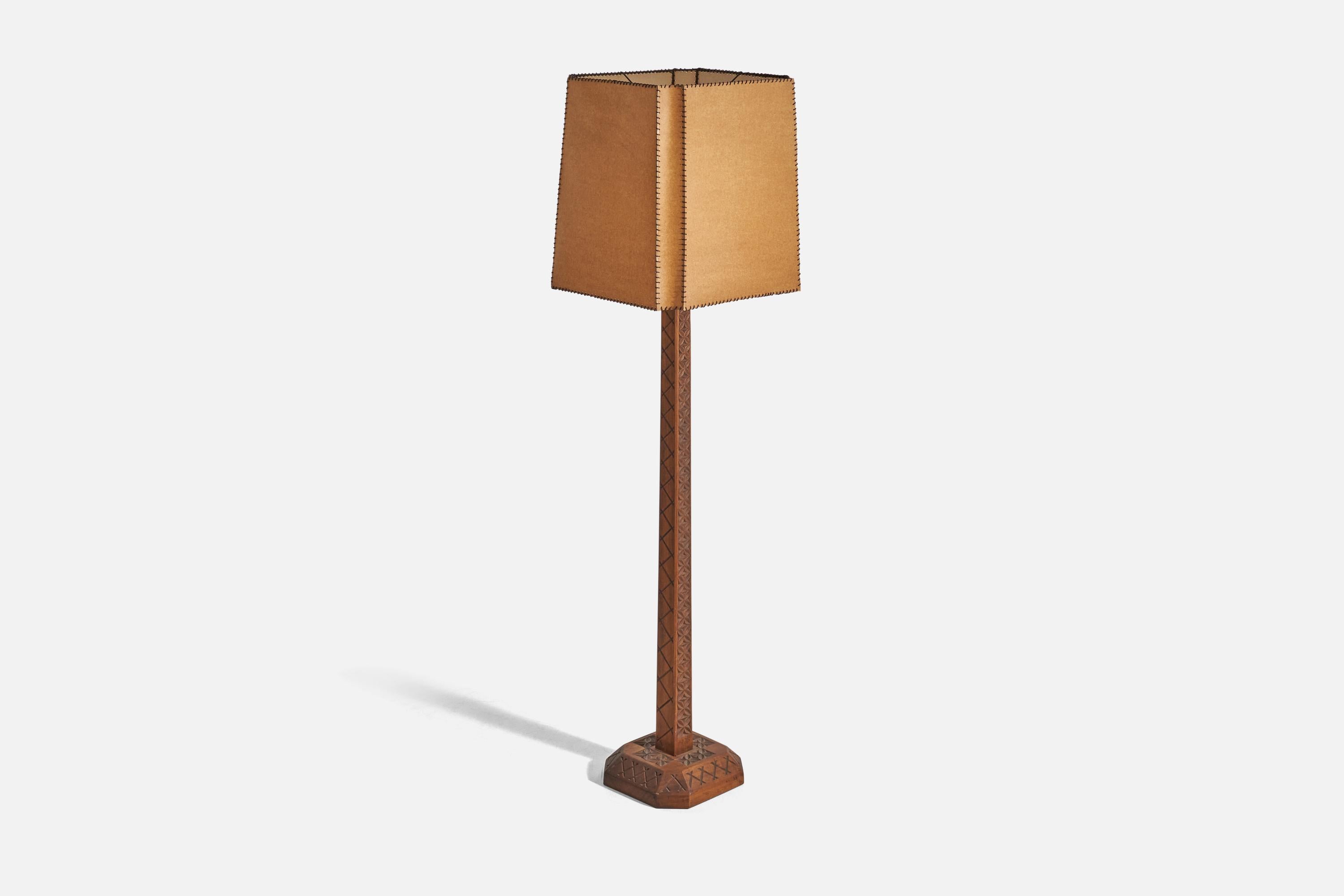 A hand-carved wood and paper floor lamp designed and produced by an American designer, USA, 1976.
  
Sold with Lampshade. Dimensions stated are of Floor Lamp with Lampshade. 

Socket takes standard E-26 medium base bulb.

There is no maximum wattage