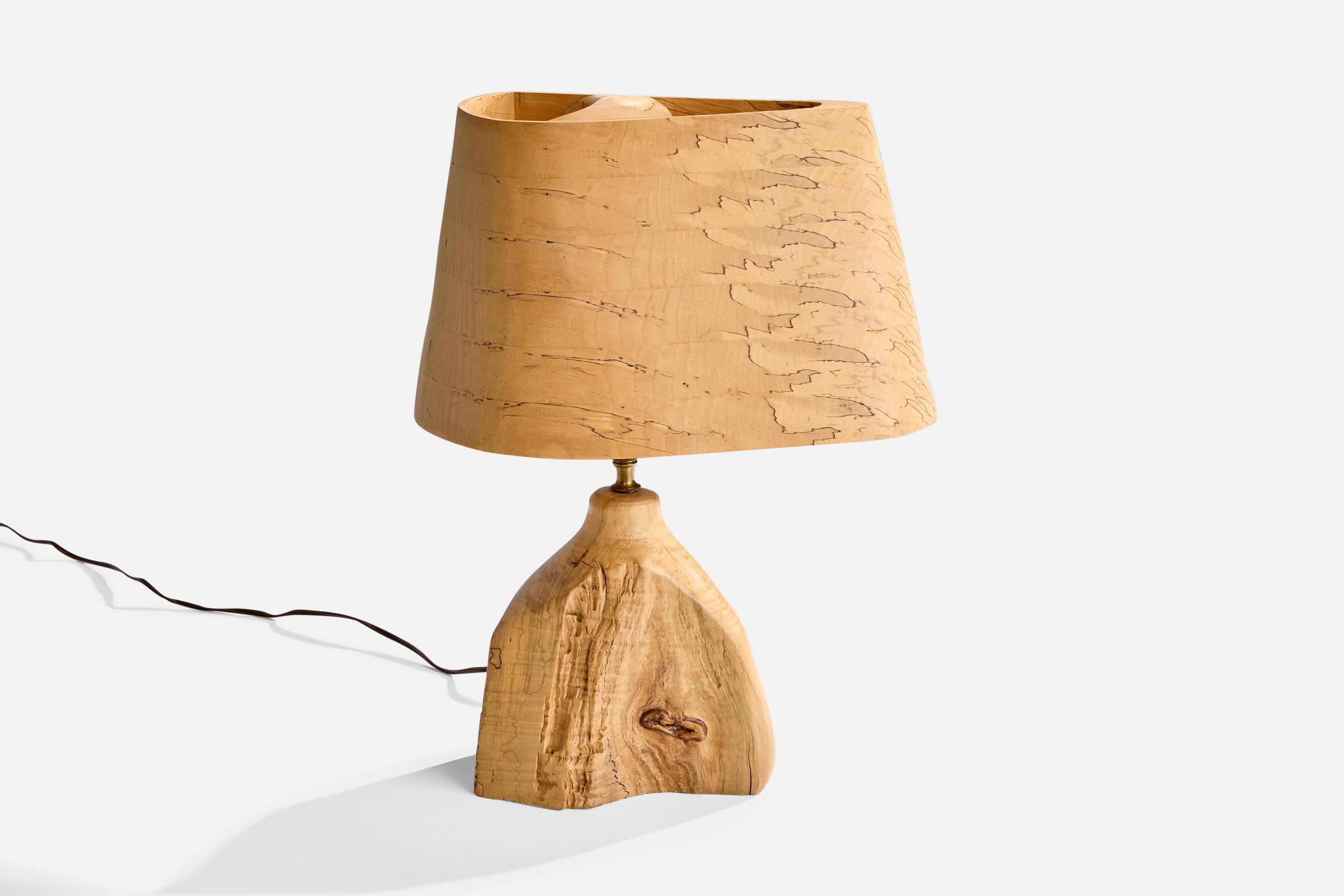 A brass and wood free form table lamp, designed and produced in the United States, c. 1950s.

Dimensions of Lamp (inches): 18.5