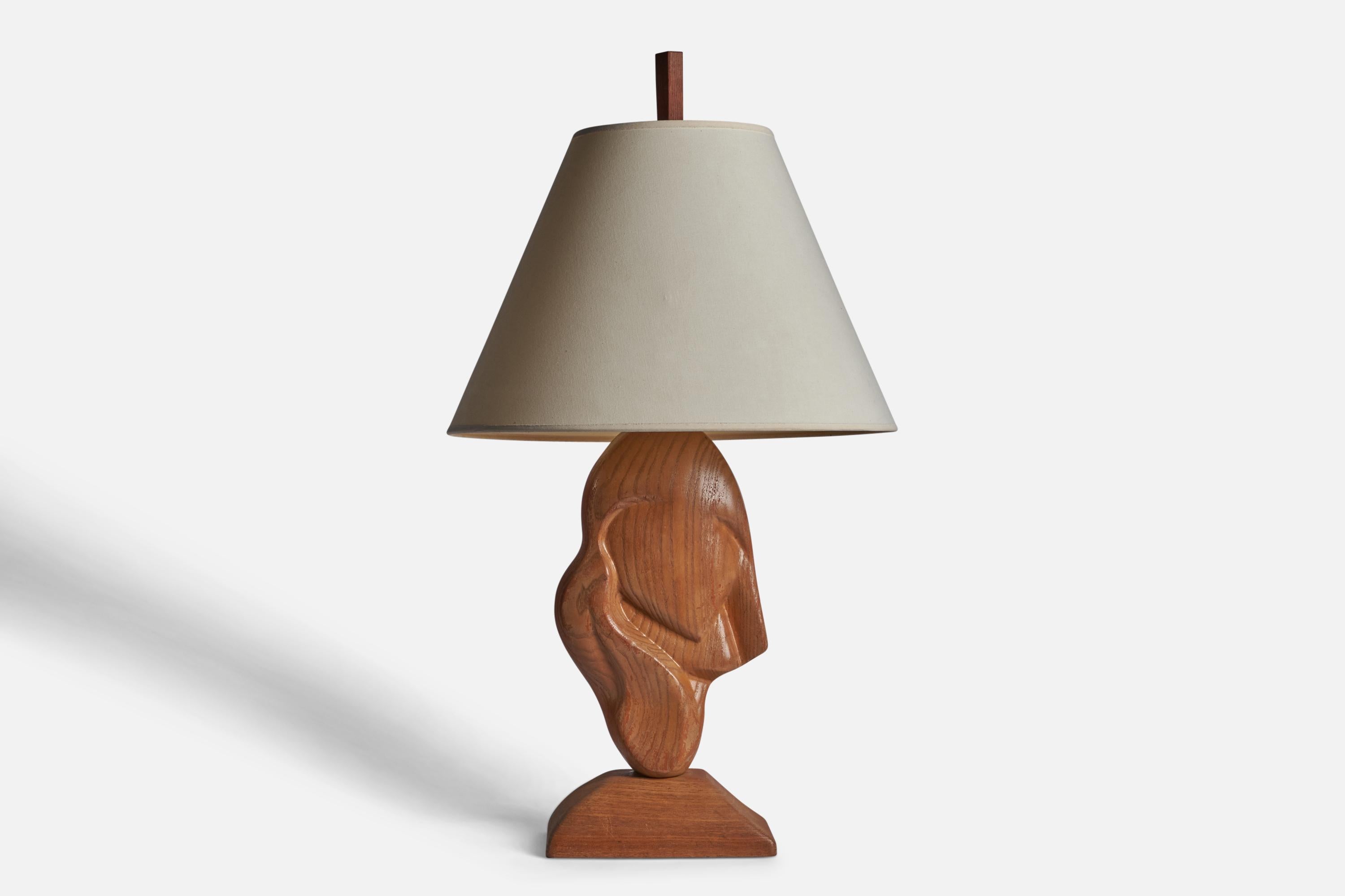 An oak and off-white fabric freeform table lamp designed and produced in the US, 1950s.

Overall Dimensions (inches): 32.5” H x 18” Diameter
Bulb Specifications: E-26 Bulb
Number of Sockets: 1