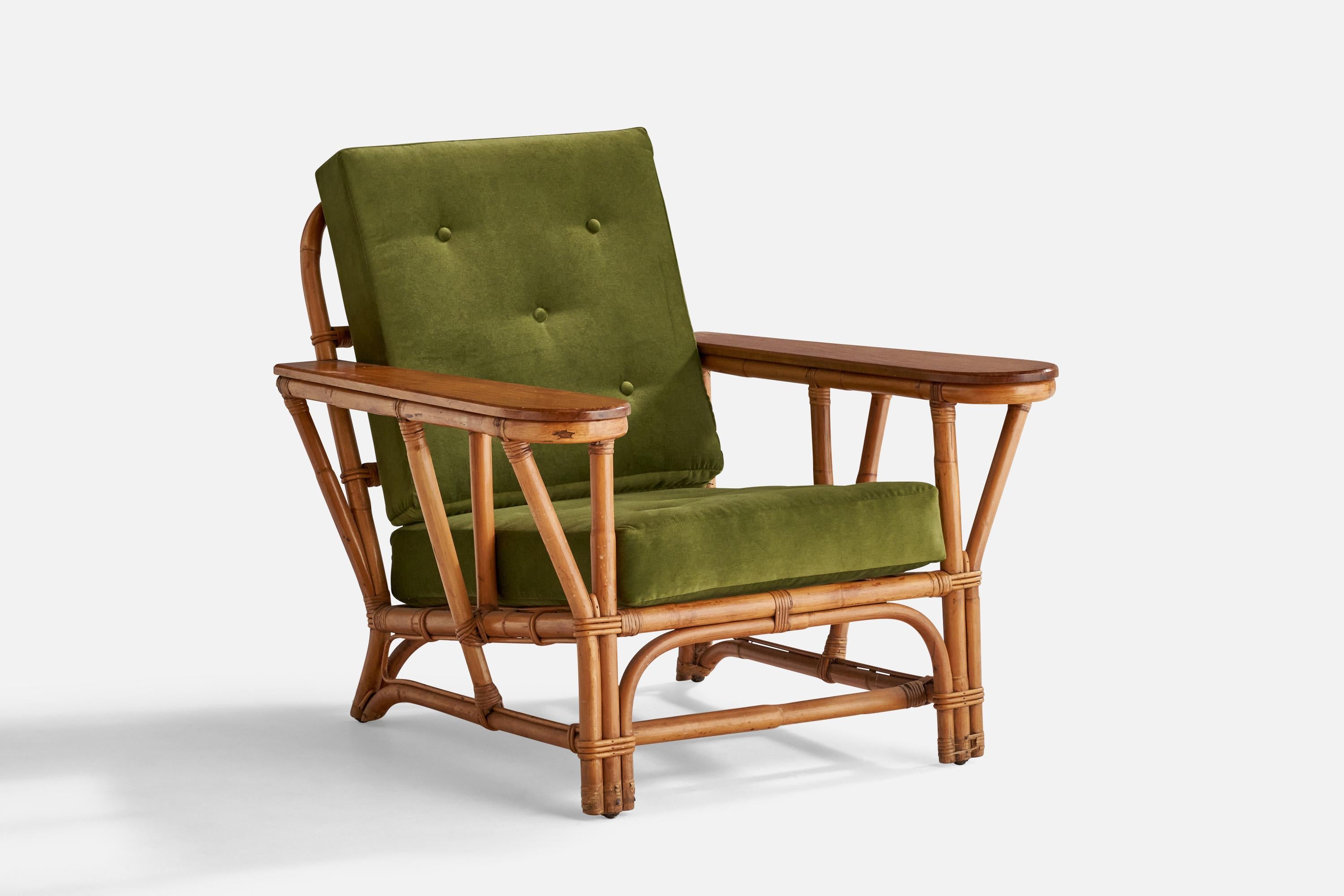 A green velvet, maple, bamboo and rattan lounge chair designed and produced in the US, 1950s.

Seat height: 16.5
