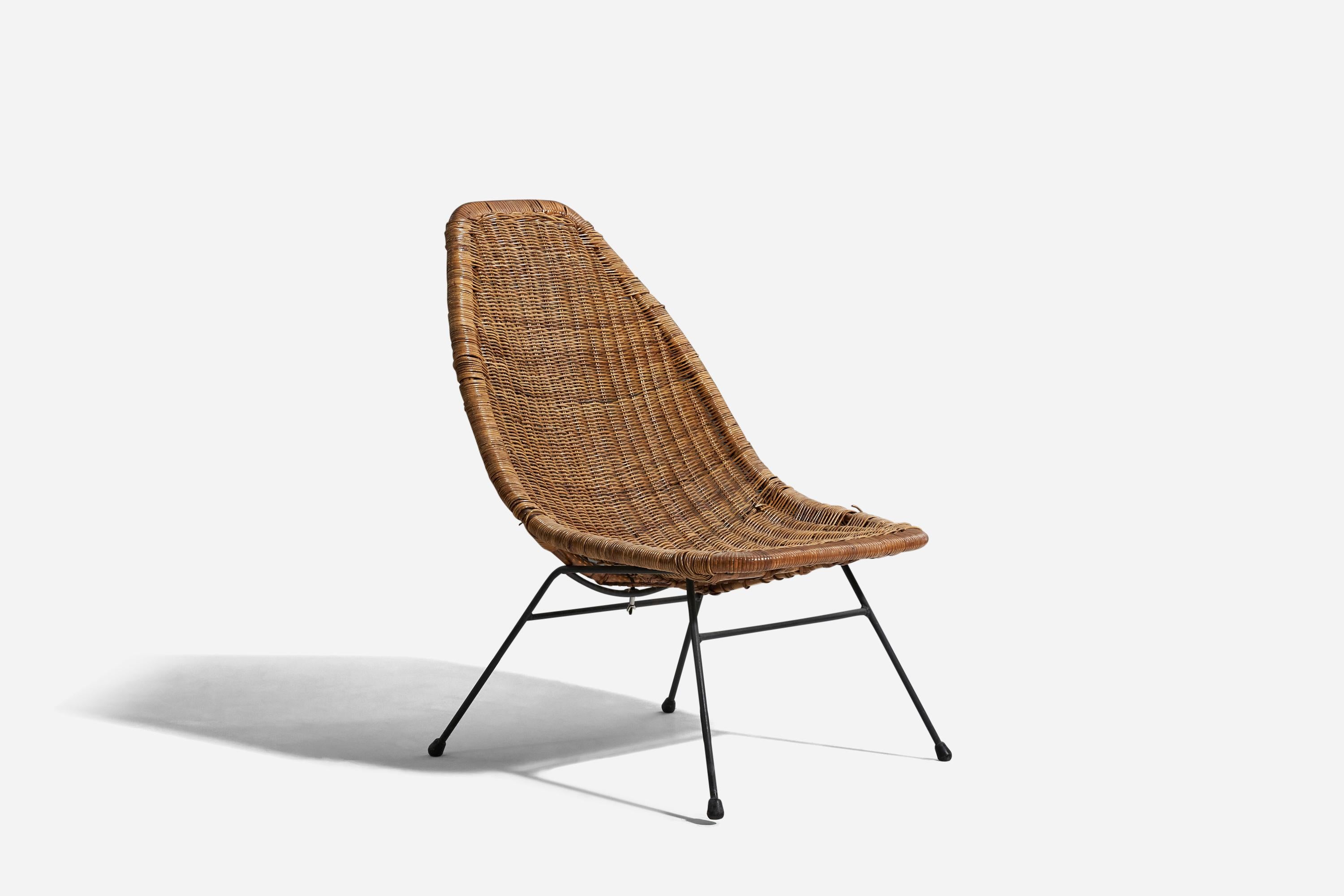 A rattan and metal lounge chair designed and produced by an American designer, United States, 1950s.






