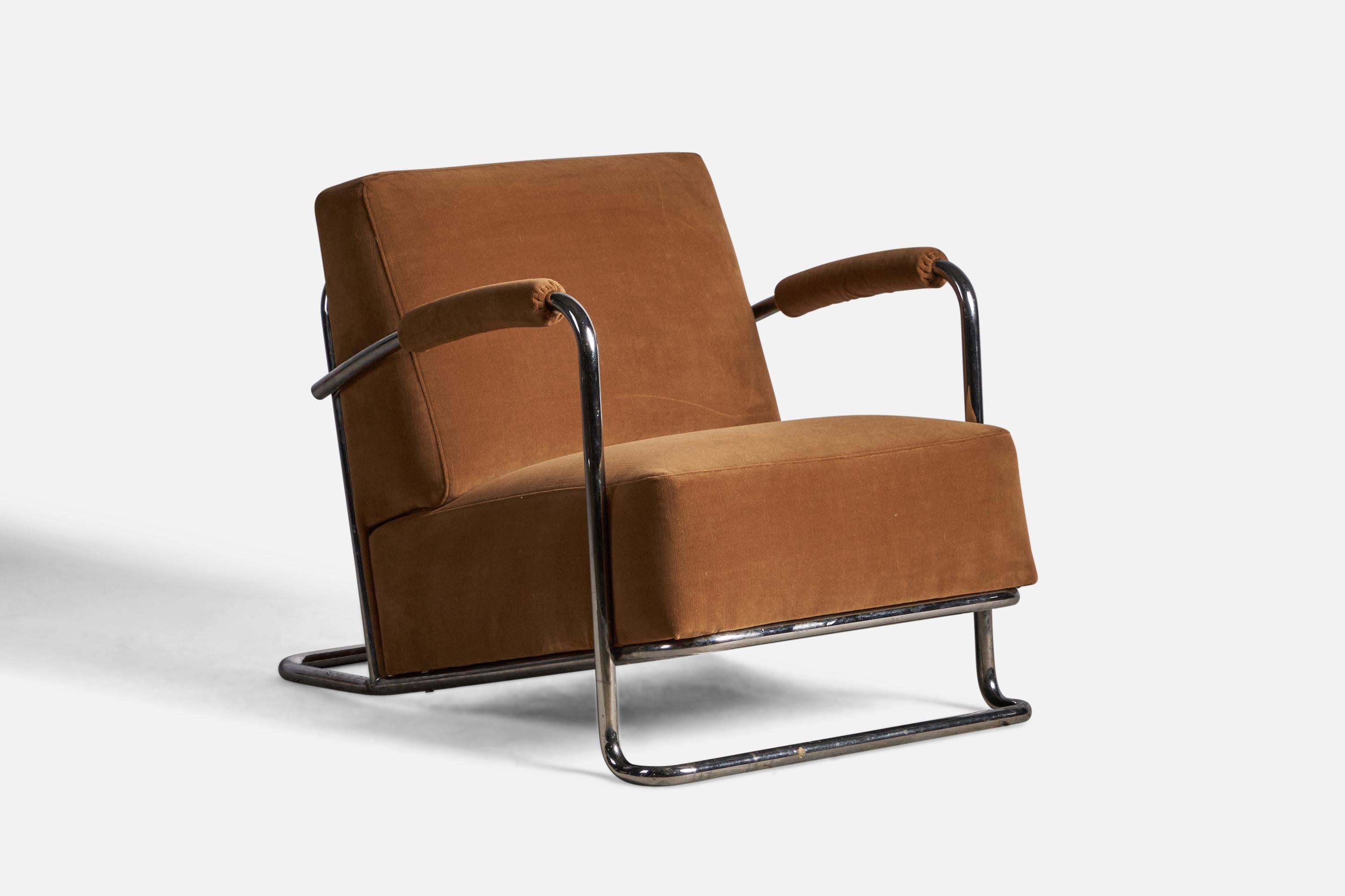 A tubular steel and brown velvet lounge chair designed and produced by René Coquery, France, 1930s.

15