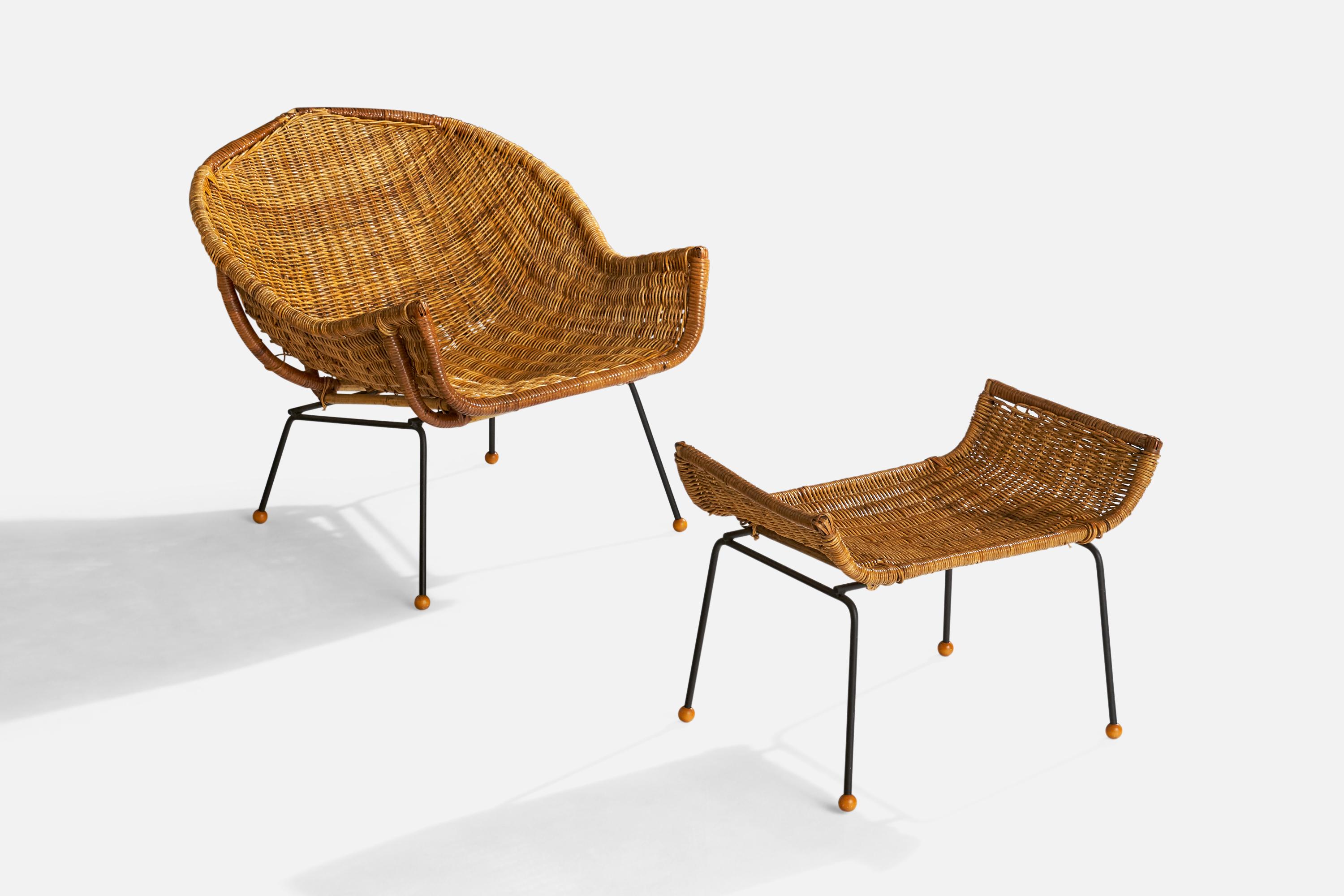 A rattan, black-painted iron and wood lounge chair with ottoman designed and produced in the US, c. 1950s.

Dimensions of Chair: 24.5” H x 28.75” W x 29” D

Dimensions of Ottoman: 16.5” H x 23.25” W x 14” D

Seat Height: 12.75” 