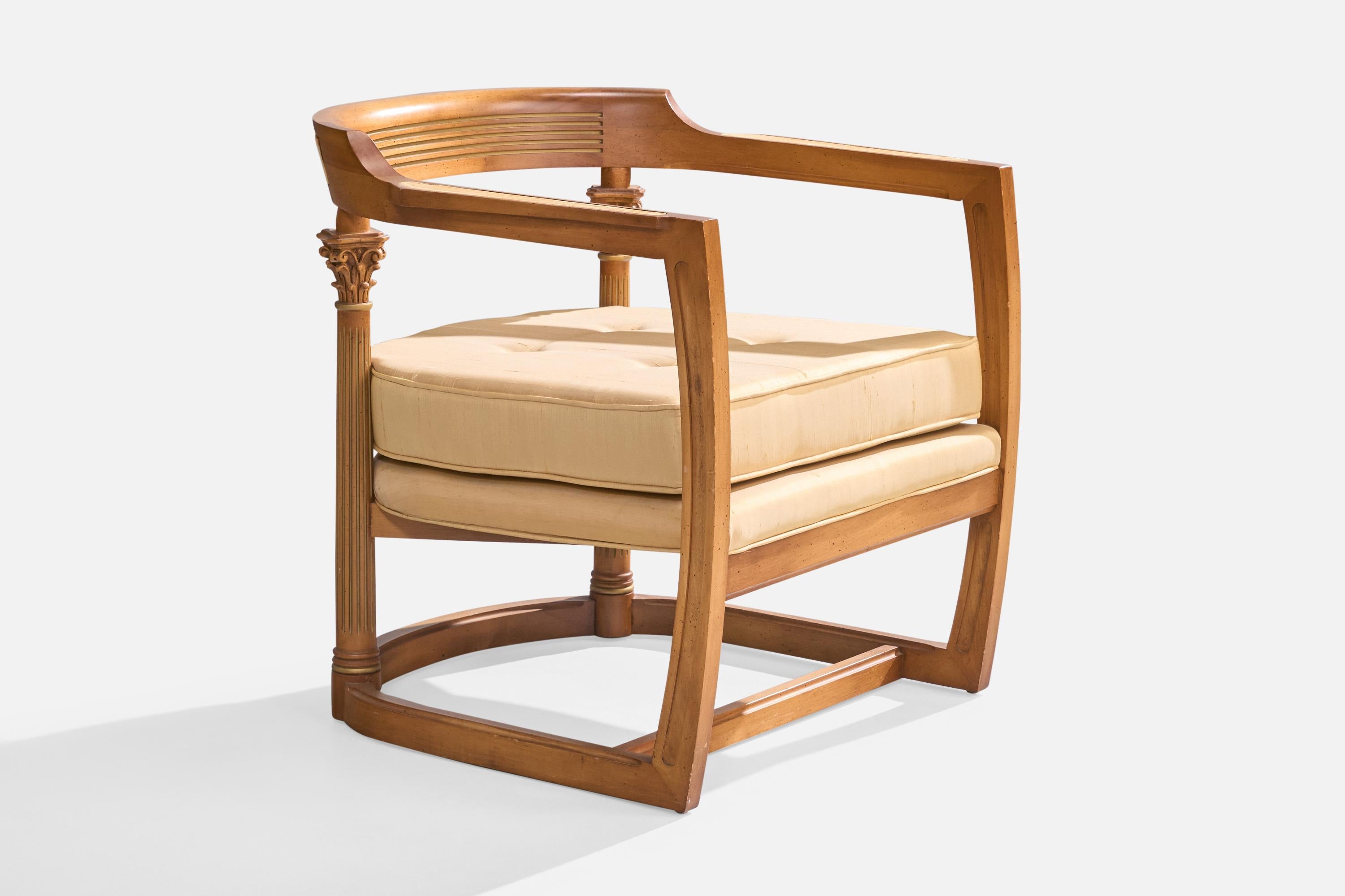 A wood and beige silk fabric lounge chair or armchair designed and produced in the USA, c. 1940s.

Fabric in fair to distressed condition, tears present to armrest. In order to replicate current fabric configuration to armrests and back, a sheer