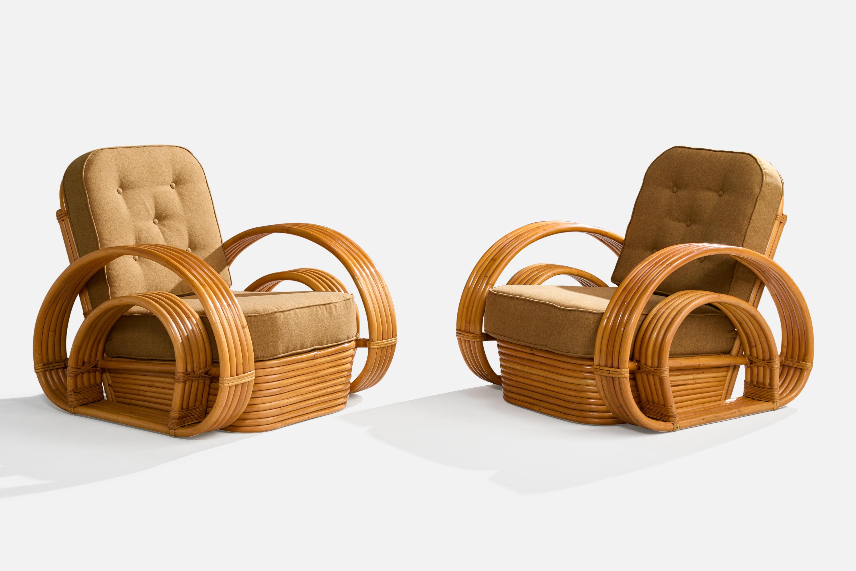 A pair of moulded bamboo, rattan and green fabric lounge chairs designed and produced in the US, c. 1950s.

Reupholstered in brand new fabric.

Overall Dimensions (inches): 33.5” H x 32.5” W x 35.75”D

Seat Height (inches): 16” H

Arm Height