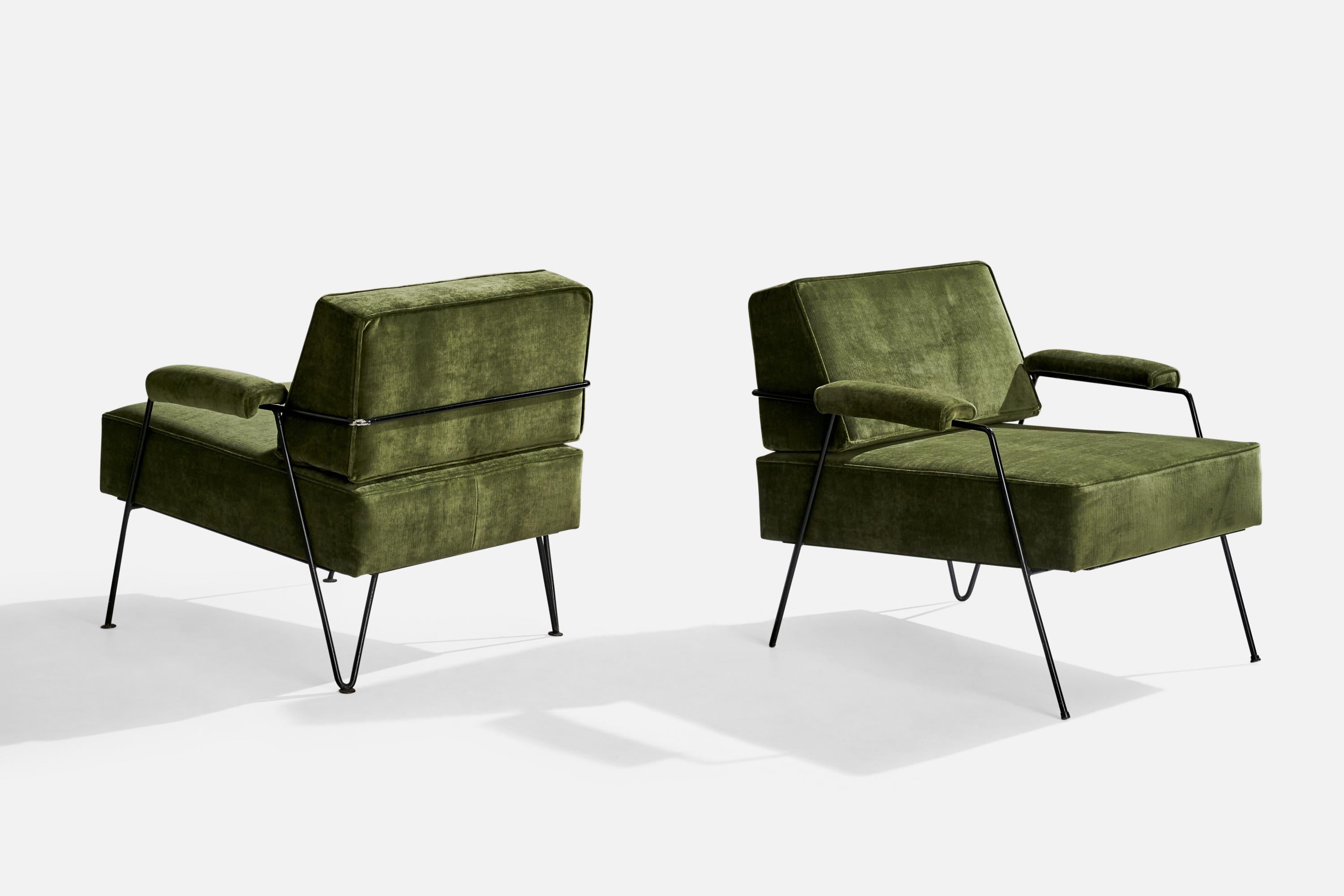 A pair of black-painted iron and green velvet lounge chairs designed and produced in the US, c. 1950s.

Dimensions: 29.2” H x 30” W x 31.5” D

Seat height: 18.5” 

