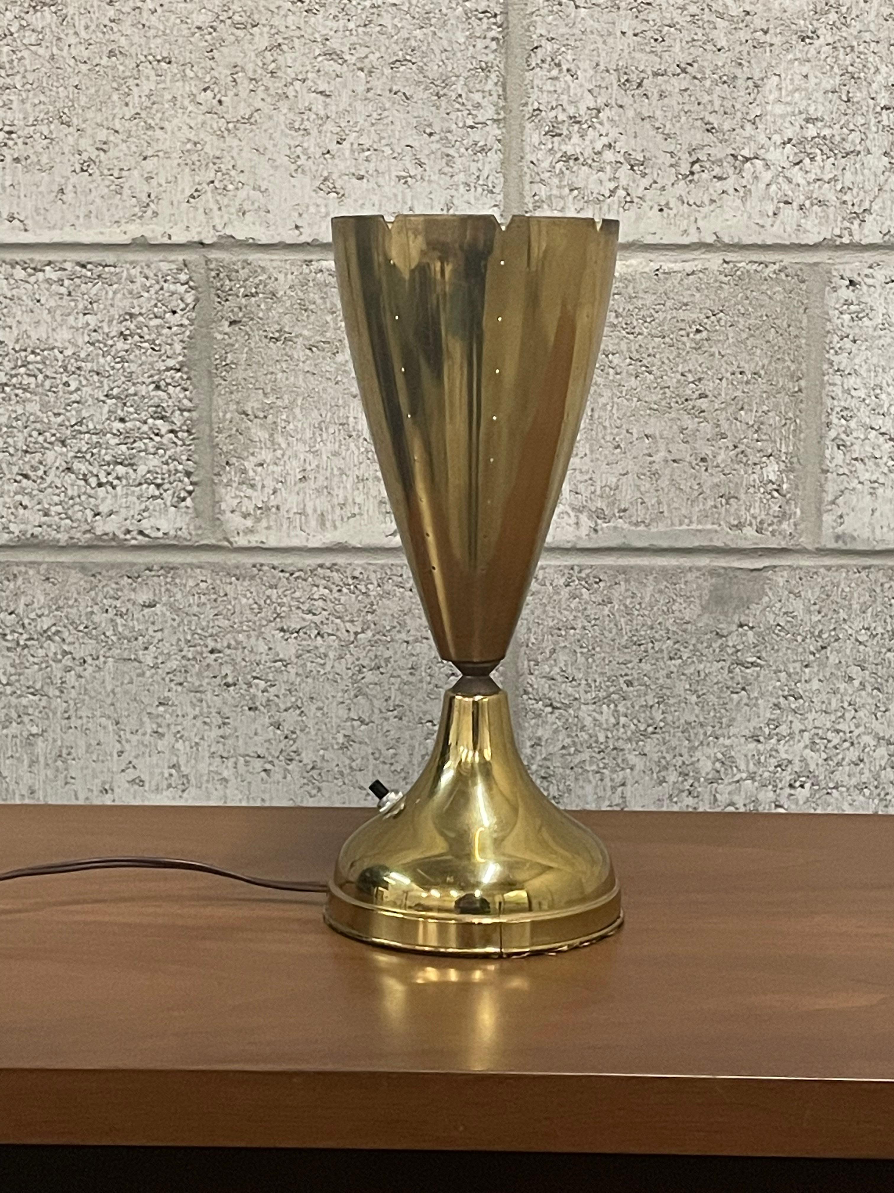 Brass cone shaped lamp with pierced shade. Design is reminiscent of Paavo Tynell and Lightolier works. Heavy weighted base.