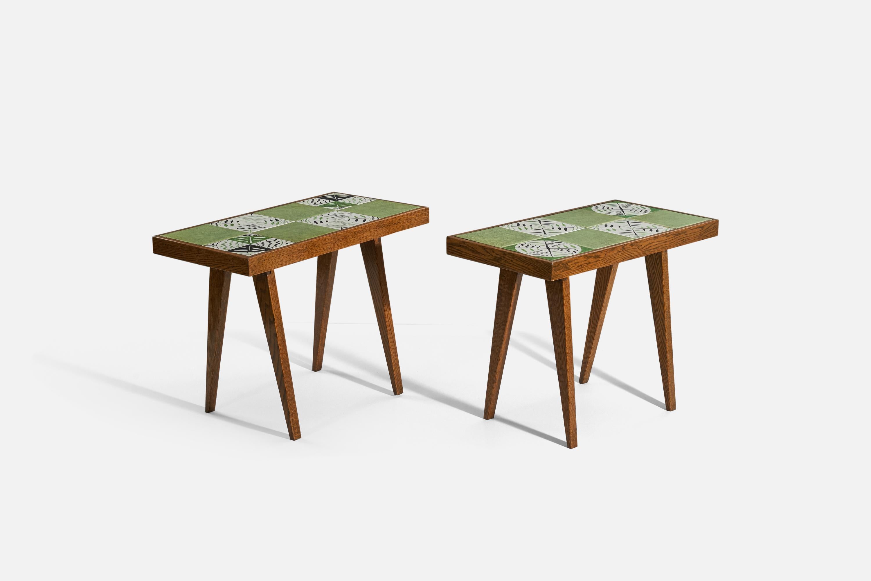 A pair of walnut, and green and white ceramic side tables, designed by an American designer, United States, c. 1950s.
 