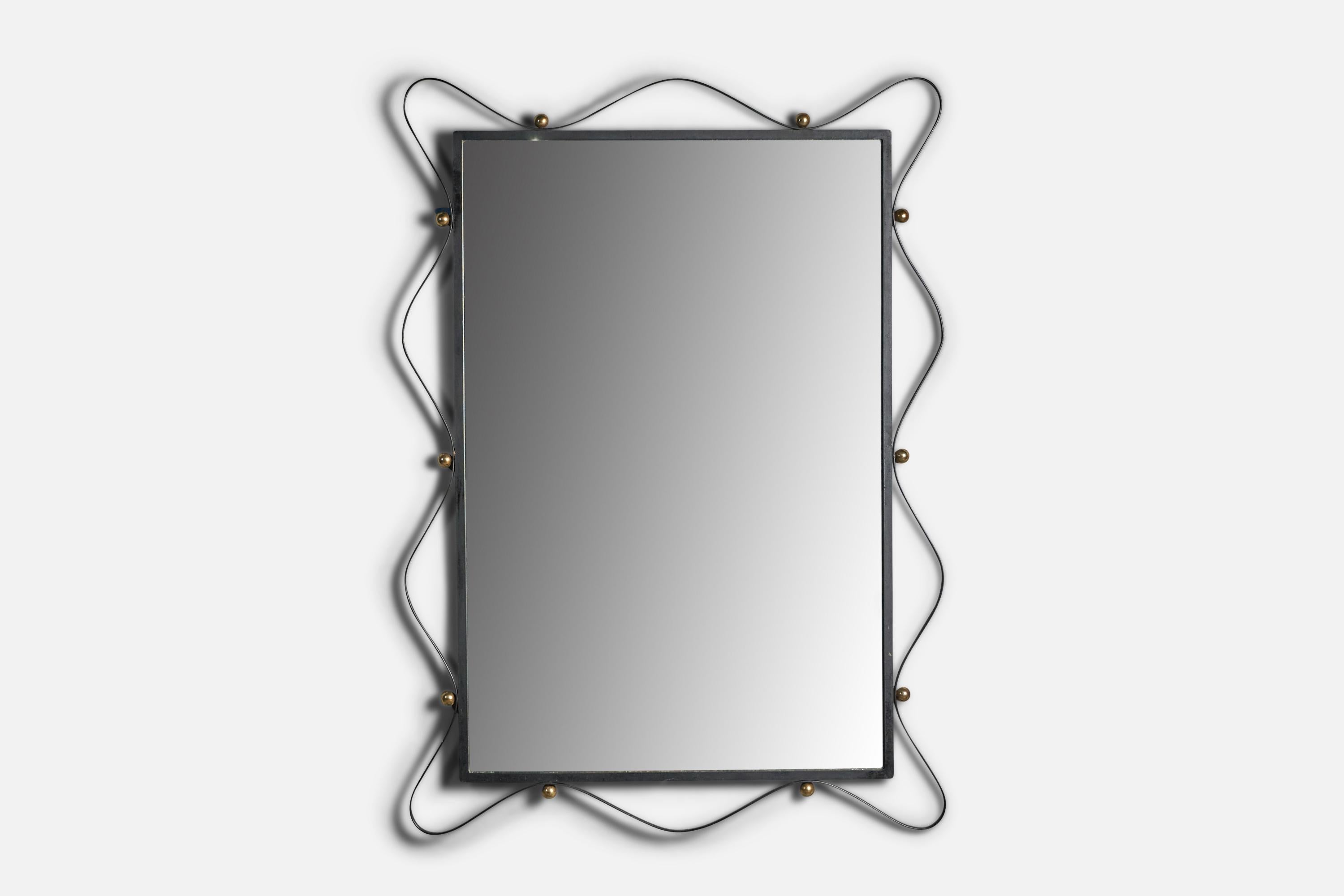 A sizeable black-lacquered metal and brass wall mirror, designed and produced in the US, c. 1950s.