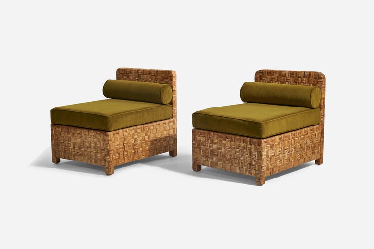 A pair of rattan and green velvet slipper chairs designed and produced by an American designer, United States, 1950s.