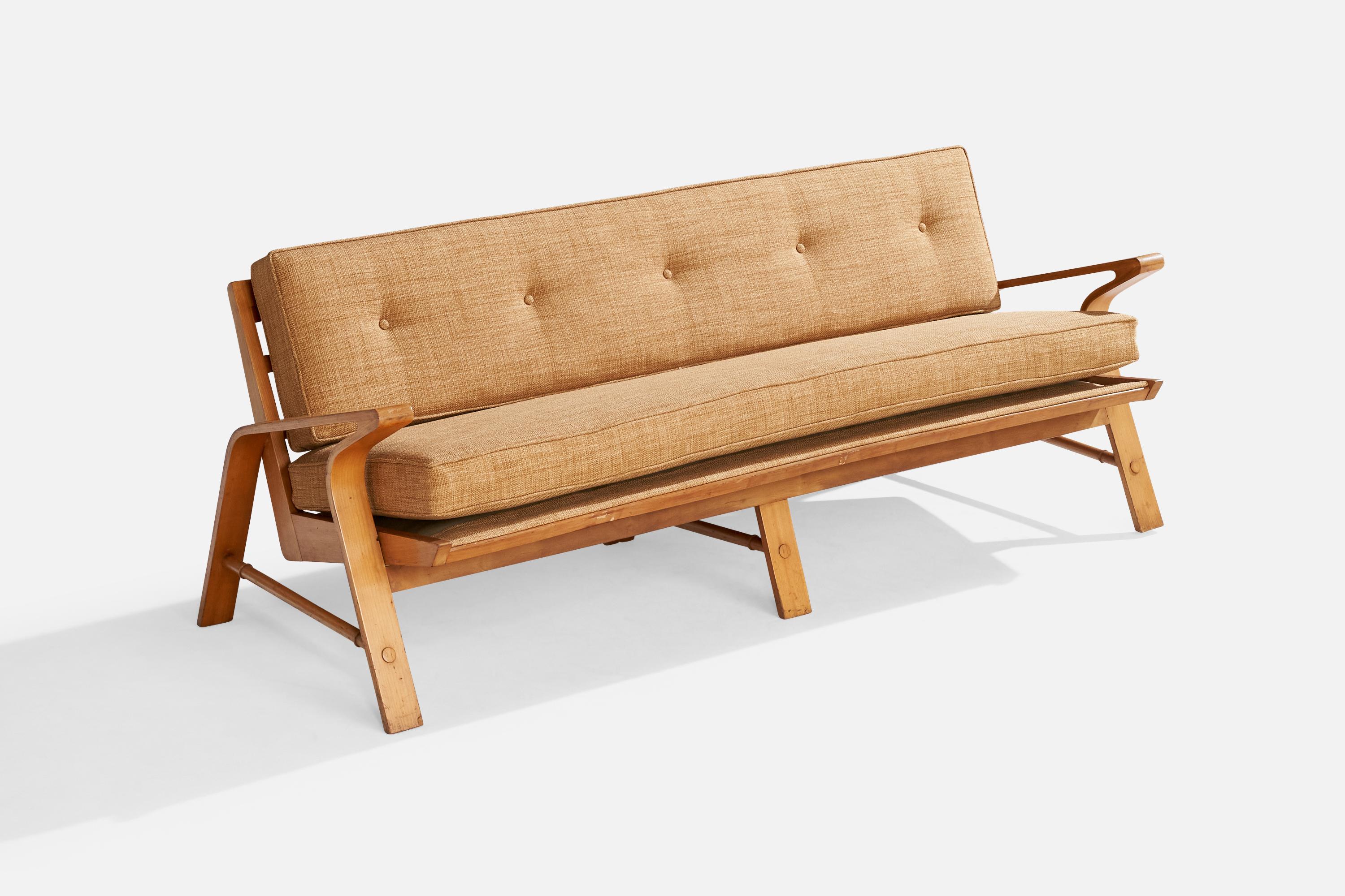 A birch and beige fabric sofa designed and produced in the US, c. 1950s.

Dimensions: 31” H x 78.5” W x 33” D

Seat Height: 20”