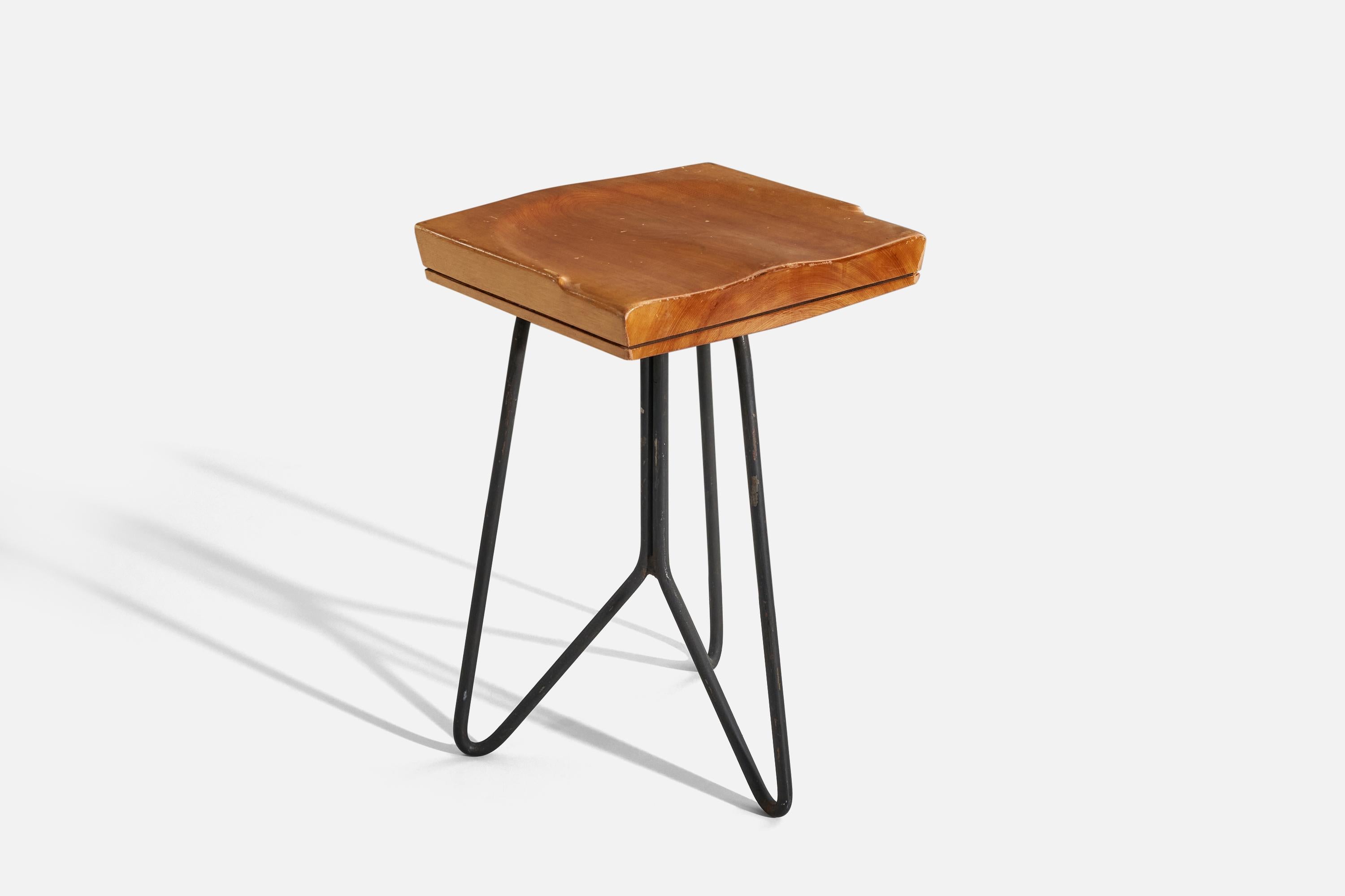 A wood and metal stool designed and produced in the United States, 1950s.