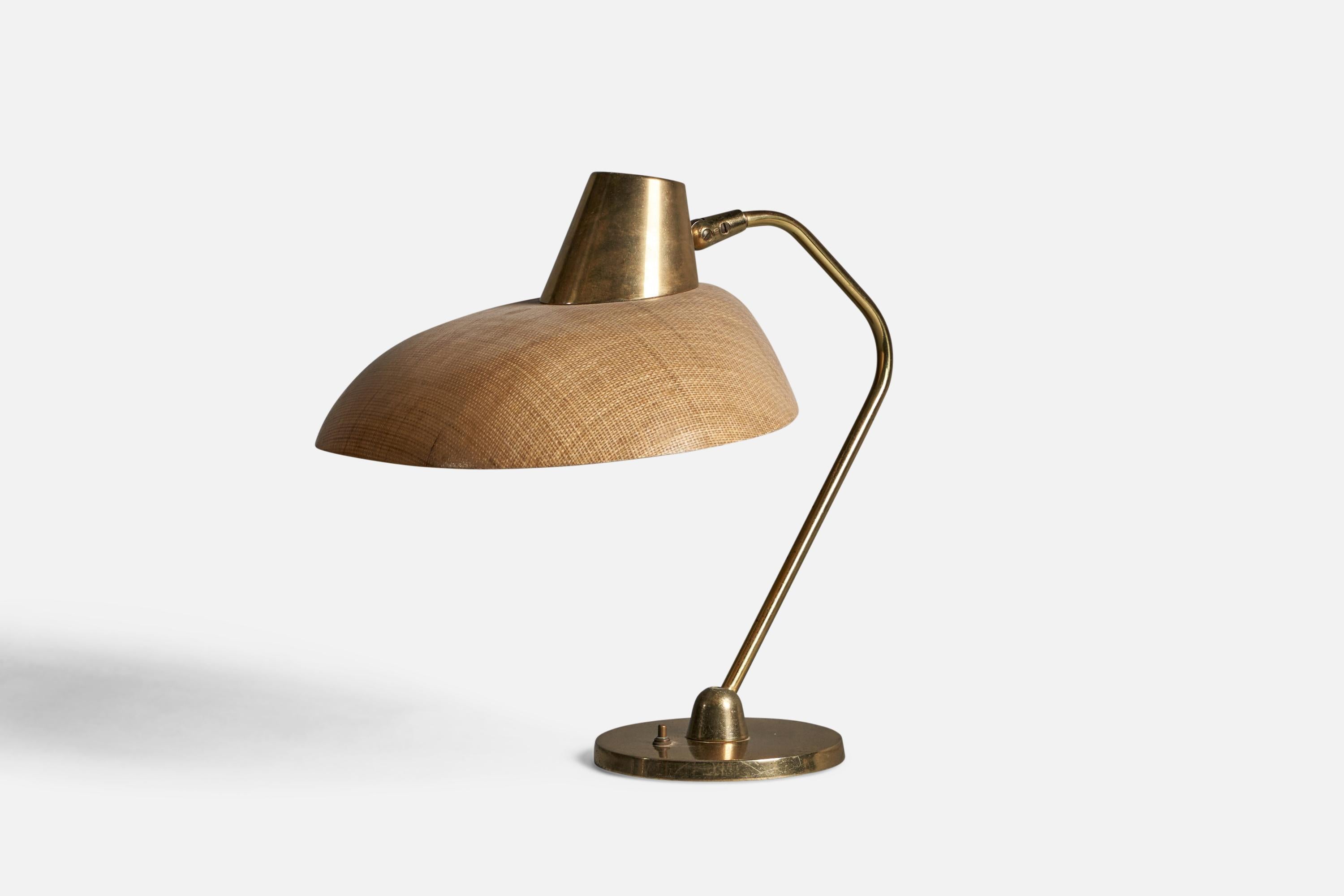 An adjustable brass, raffia and fiber glass table lamp, designed and produced in the US, 1950s.

Overall Dimensions (inches): 17.25