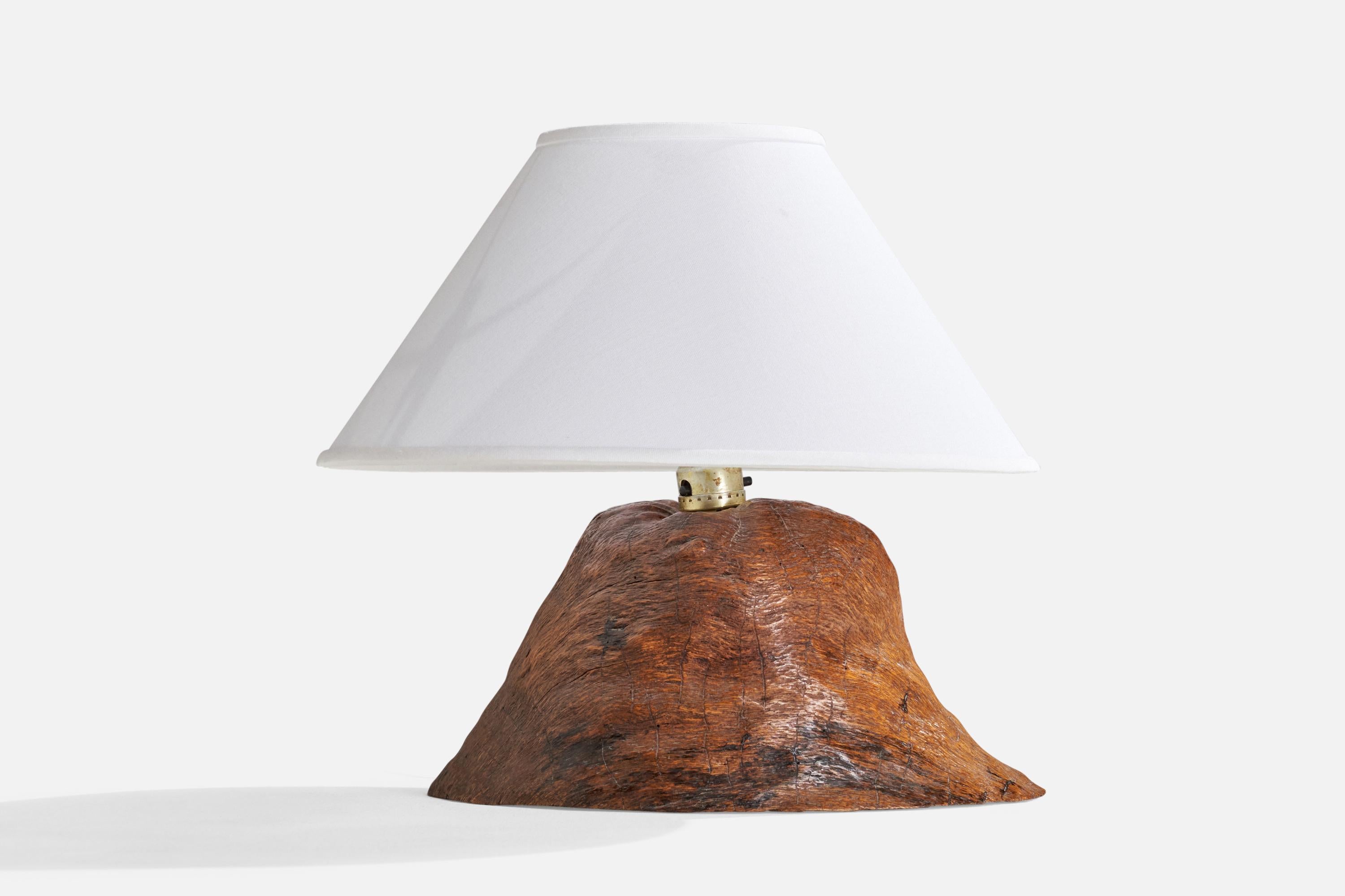 A burl wood and brass table lamp designed and produced in the US, 1950s.

Dimensions of Lamp (inches): 13”  H x 9” Diameter
Dimensions of Shade (inches): 6”  Top Diameter x 16”  Bottom Diameter x 9” H
Dimensions of Lamp with Shade (inches): 15” H x