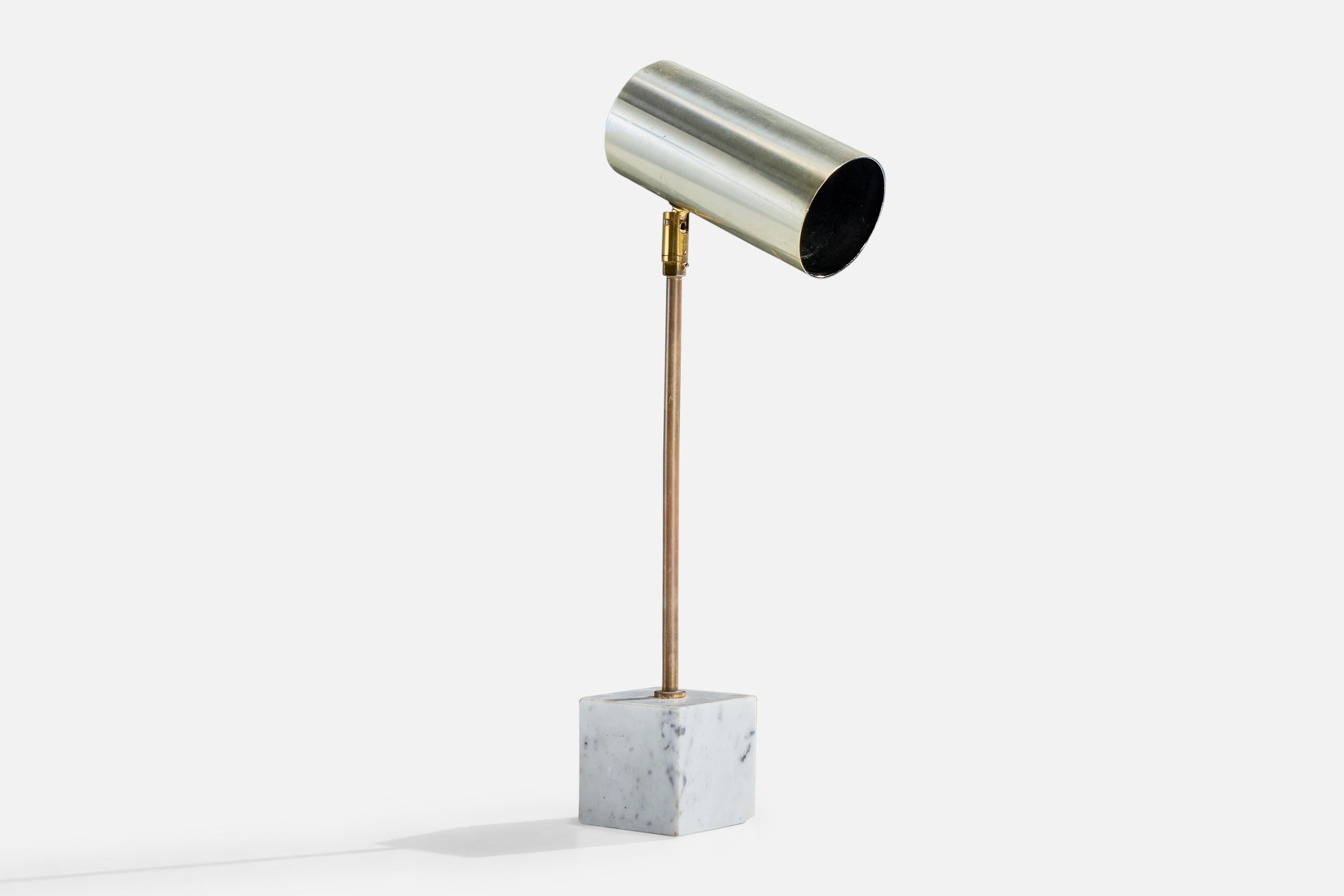 An adjustable metal, brass and marble table lamp designed and produced in the US, c. 1960s.

Oxidation present to brass and metal

Minor scratching present to marble

Wear consistent with age and use

Shade is adjustable; measured as