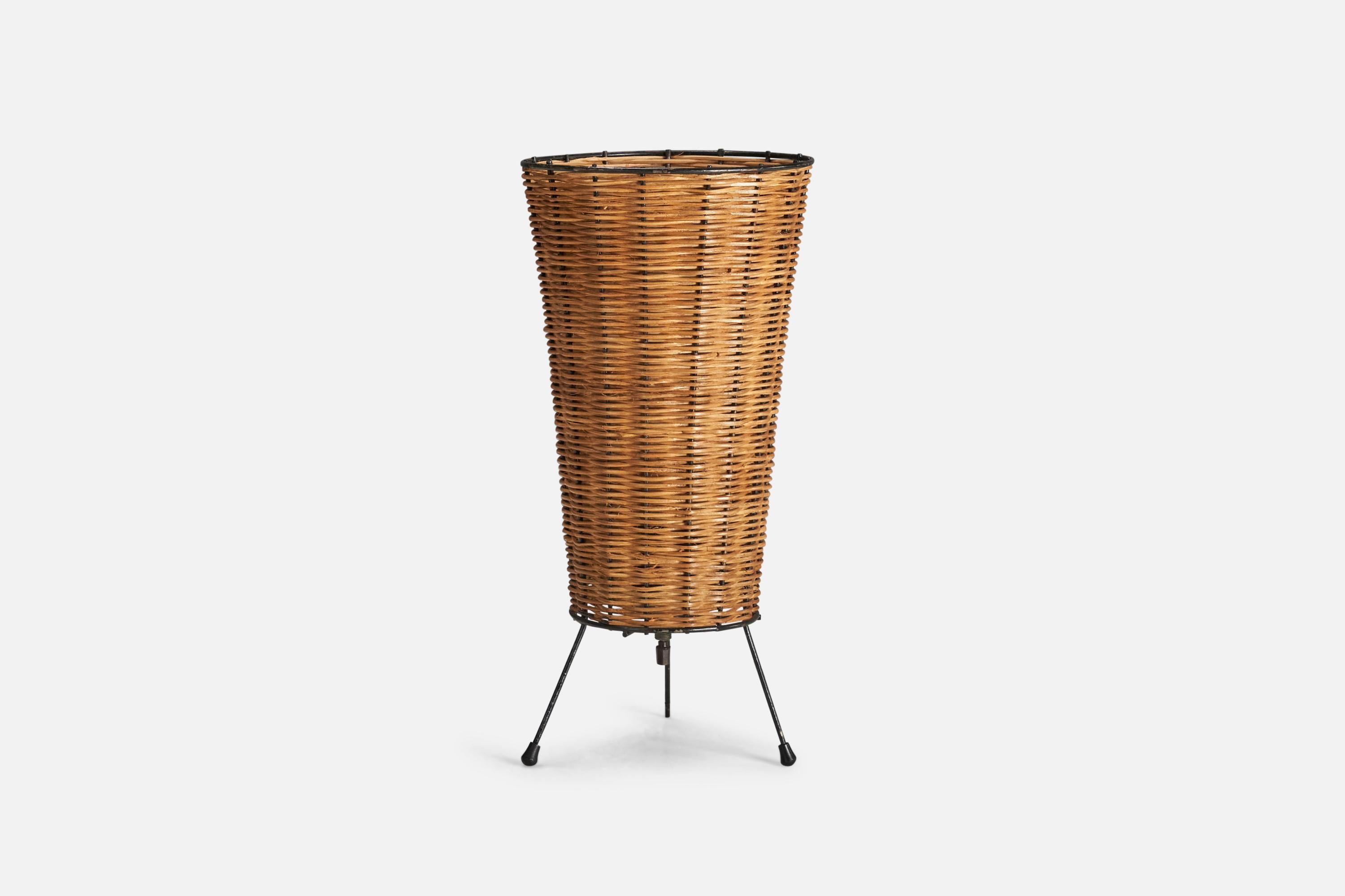 A rattan and metal table lamp designed and produced by an American Designer, USA, 1950s.