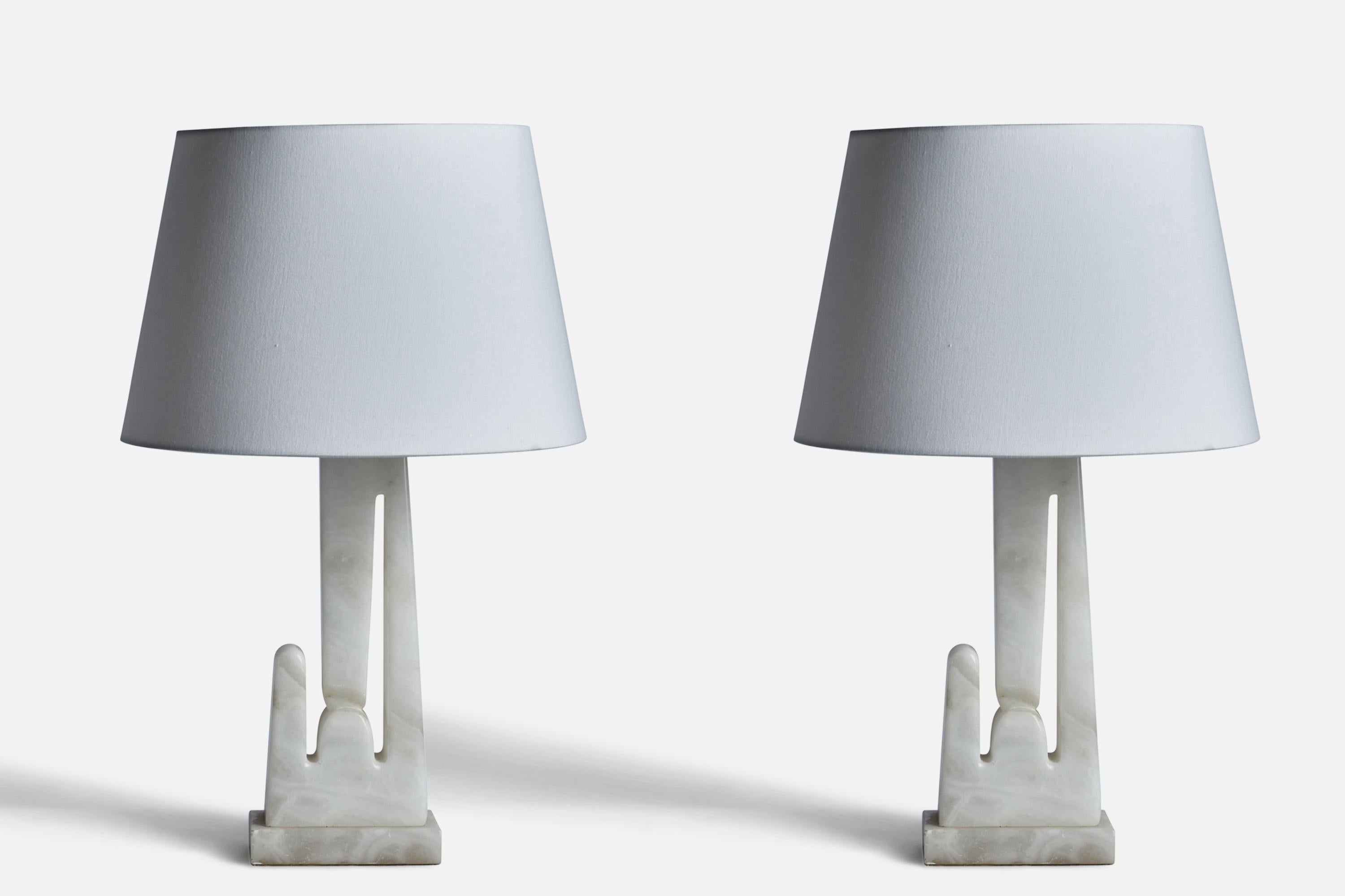A pair of marble table lamps designed and produced in the US, 1950s.

Dimensions of Lamp (inches): 18.75” H x 6.5” W x 4.15” D
Dimensions of Shade (inches): 12” Top Diameter x 16” Bottom Diameter x 10.75” H
Dimensions of Lamp with Shade (inches):