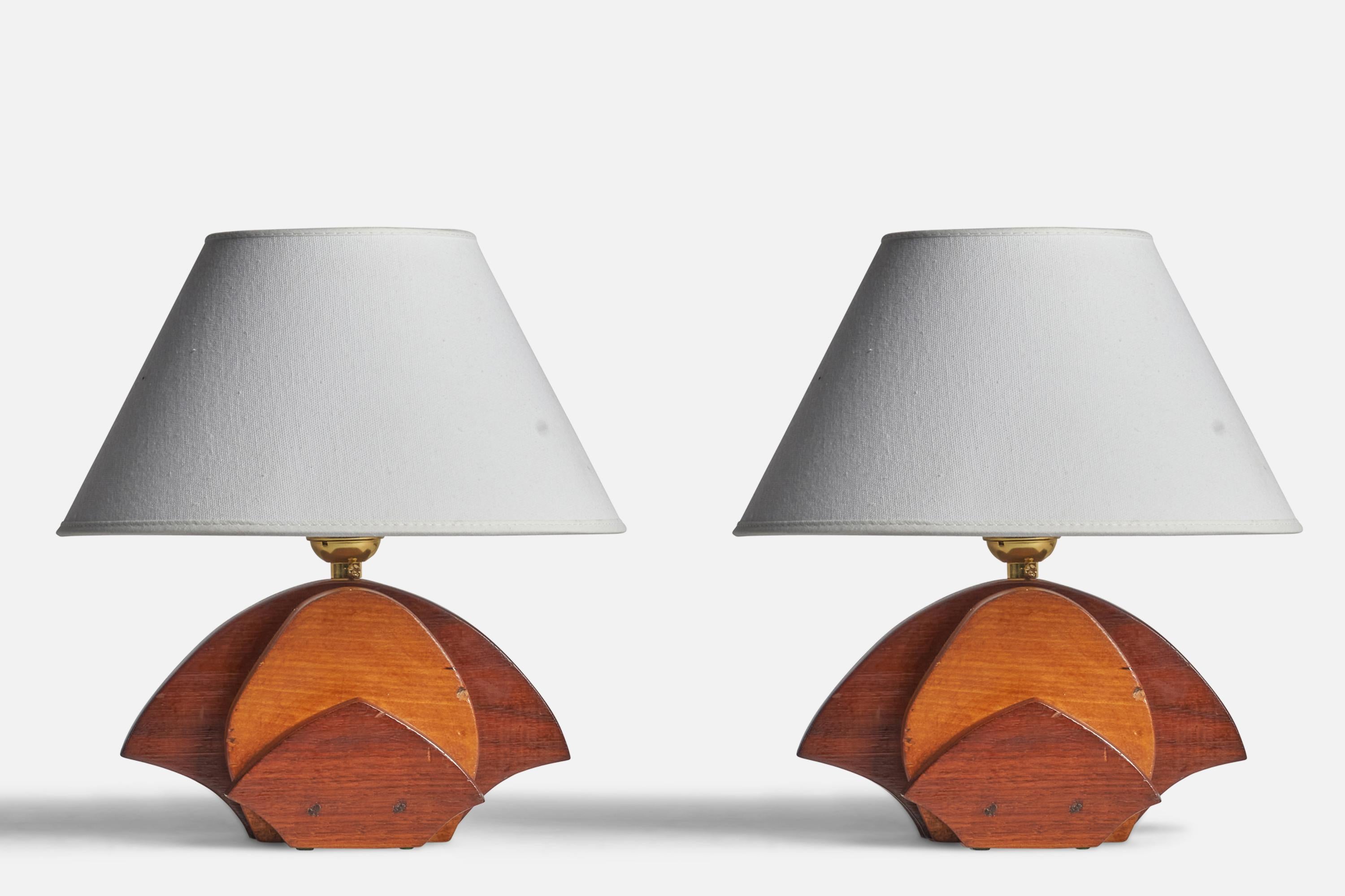 A pair of oak and walnut table lamps designed and produced in the US, c. 1940s.

Dimensions of Lamp (inches): 7.5” H x 8” W x 4.5” D
Dimensions of Shade (inches): 4.5” Top Diameter x 10” Bottom Diameter x 5.25” H 
Dimensions of Lamp with Shade
